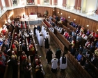 Pictured are the Choir of Trinity College Processing into the Chapel at the start of the Trinity Monday Service of Commemoration and Thanksgiving.