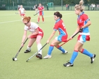 Pictured is action from a Hockey match between Alexandra College (red and white) and Mount Sackville (blue and red). The match was part of a programme of events to mark the official opening of two new pitches and one all purpose court in Alexandra College. The match was played on the Jenny Robinson (nee Telford) pitch named after a prominent ex-student. Alexandra College won the match 2-1.