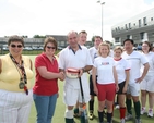 Wicklow team Captain Brian O'Rourke receives the 'potty' for coming last in the  Diocesan Inter Parish hockey Tournament. Also pictured are organisers the Revd Gillian Wharton (left) and beside her, the Revd Anne Taylor.