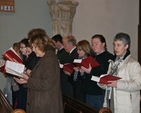 The choir pictured at the service to dedicate the St Francis stained glass window in Sandford Parish Church. 