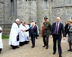 President Michael D Higgins greets clergy outside the Church of St John the Baptist after the service commemorating the 1,000th anniversary of the Battle of Clontarf. 