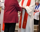 The new rector of Raheny and Coolock, the Revd Norman McCausland, is presented with the gifts of ministry during his service of institution in All Saints’ Raheny on Friday November 29. 