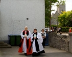 Archbishop Michael Jackson and the Revd Dr Norman Gamble make their way across to the school from St Andrew’s Church in Malahide to St Andrew’s National School were the new extension was officially opened this morning, October 11. 