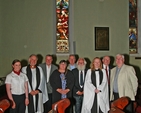 Caroline Scott, Stena; Canon Adrian Empey; Eamon Hewitt, Communications Manager, Stena; Jean Llewelyn Williams, Deputy Mayor of Holyhead; Joe Ryan, Irish Maritime Institute; Richard Burrell, Holyhead Maritime Museum; the Reva Sonia Gyles; Brian Scott, Stena and service organiser; and Terry Doyle, Dun Laoghaire Port Manager, Stena, standing in front of the window to commemorate WG Skipworth at the Service to mark 450 years of mail services between Dublin Area and Holyhead which took place at St Philip's, Milltown. Photo: David Wynne.