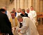 Foot washing during the Chrism Eucharist on Maundy Thursday in Christ Church Cathedral.