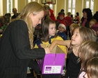 The Revd Sonia Gyles has help to draw the winning raffle ticket at the recent Sandford Parish Christmas Bazaar.