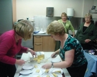 Hazel Garrett & Sandra Maxwell (cutting up cake), Deidre Jones & Elizabeth Adamson at the Clontarf Mothers’ Union 80th anniversary.