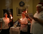 The Polish members of staff at St John's House sing a carol from their native land for residents at St John's House.