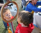 Checking out the facepainting job at the Rathmichael Parish Fete.