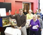 Brian Dobson of RTE pulls the winning raffle ticket at the Royal Hospital Donnybrook's Christmas Sale. Photo: Eamonn Quigley