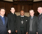 Archbishop Desmond Tutu (centre) with the Chaplains of Trinity College Dublin, (left to right) the Revd Julian Hamilton (Methodist/Presbyterian), the Revd Darren McCallig (Church of Ireland), Fr Paddy Gleeson and Fr Kieron  Dunne (Roman Catholic).