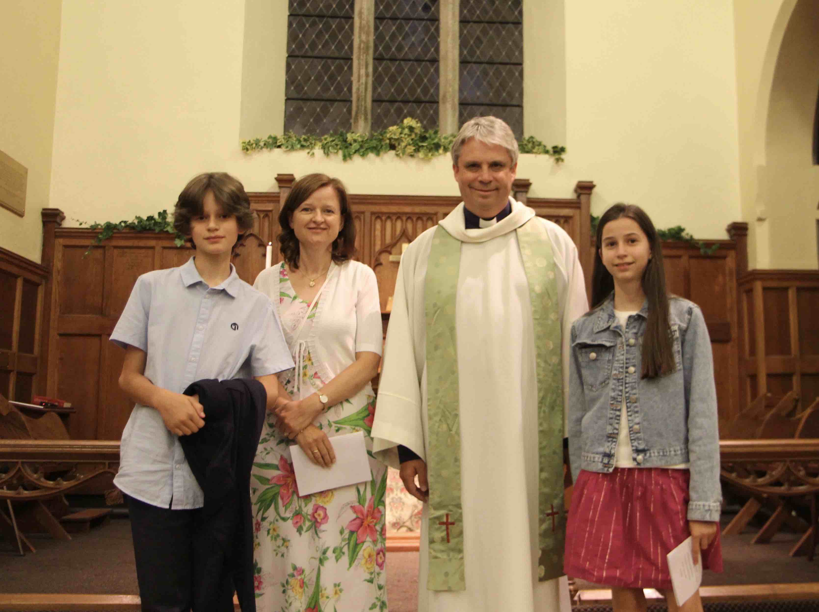 The Revd David Bowles and his wife Michelle with their children.