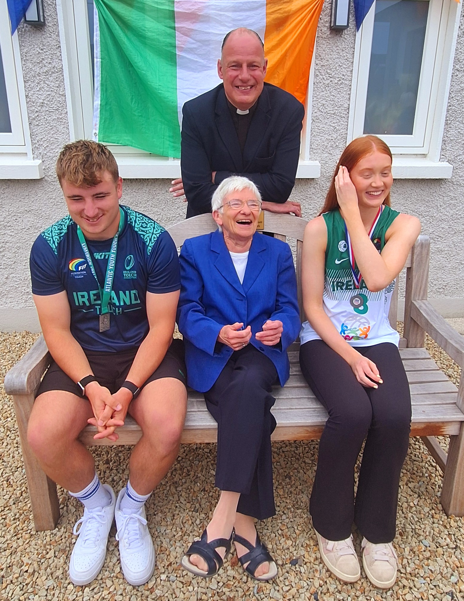 Lewis Thornton and Scarlett Livingston with Prof Elizabeth Oldham and the Rector Canon Roy Byrne.