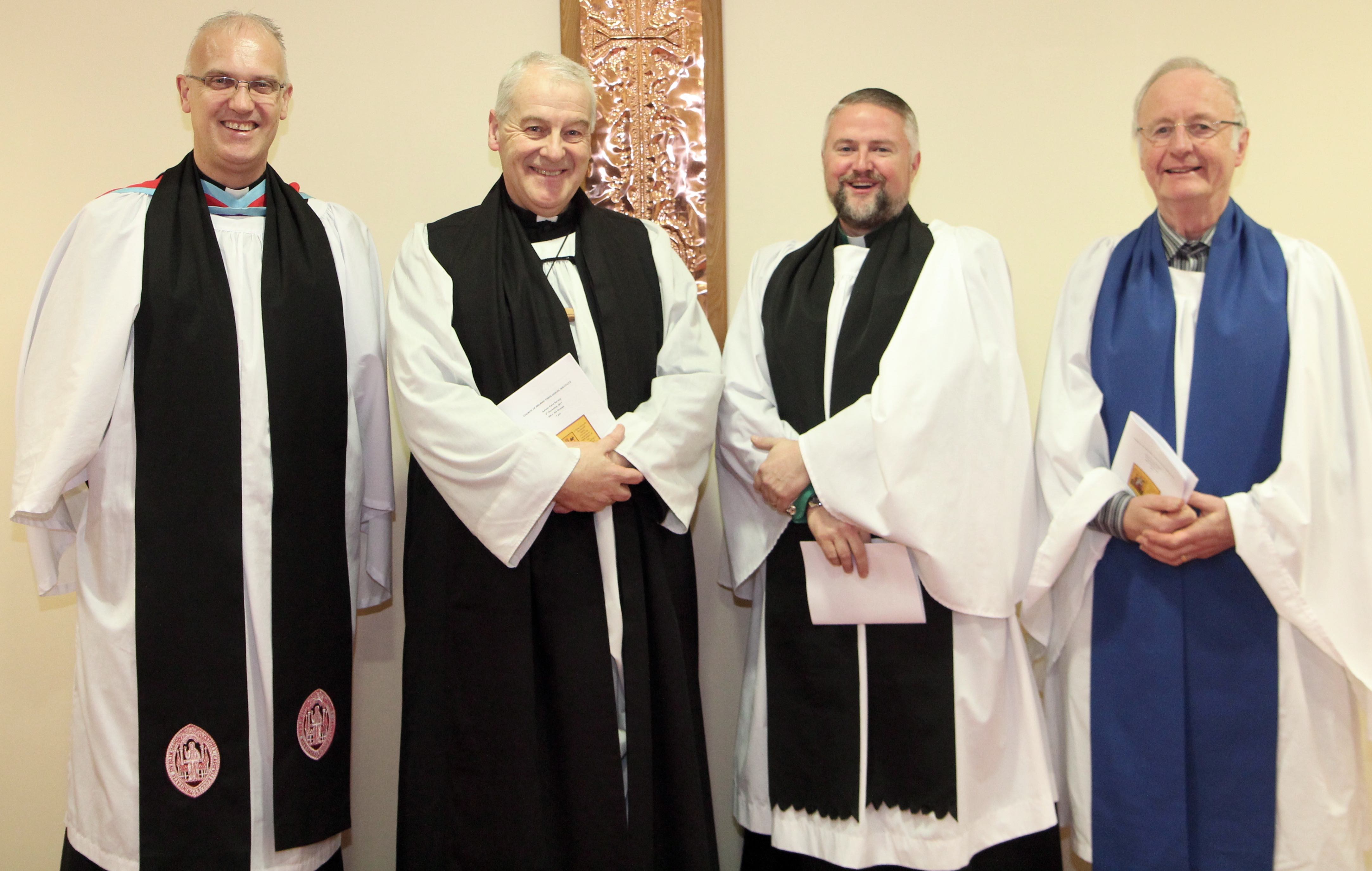 Canon Dr Maurice Elliott, Archbishop Michael Jackson, the Revd Alan Breen and Derek Singleton at the CITI Advent Carol Service