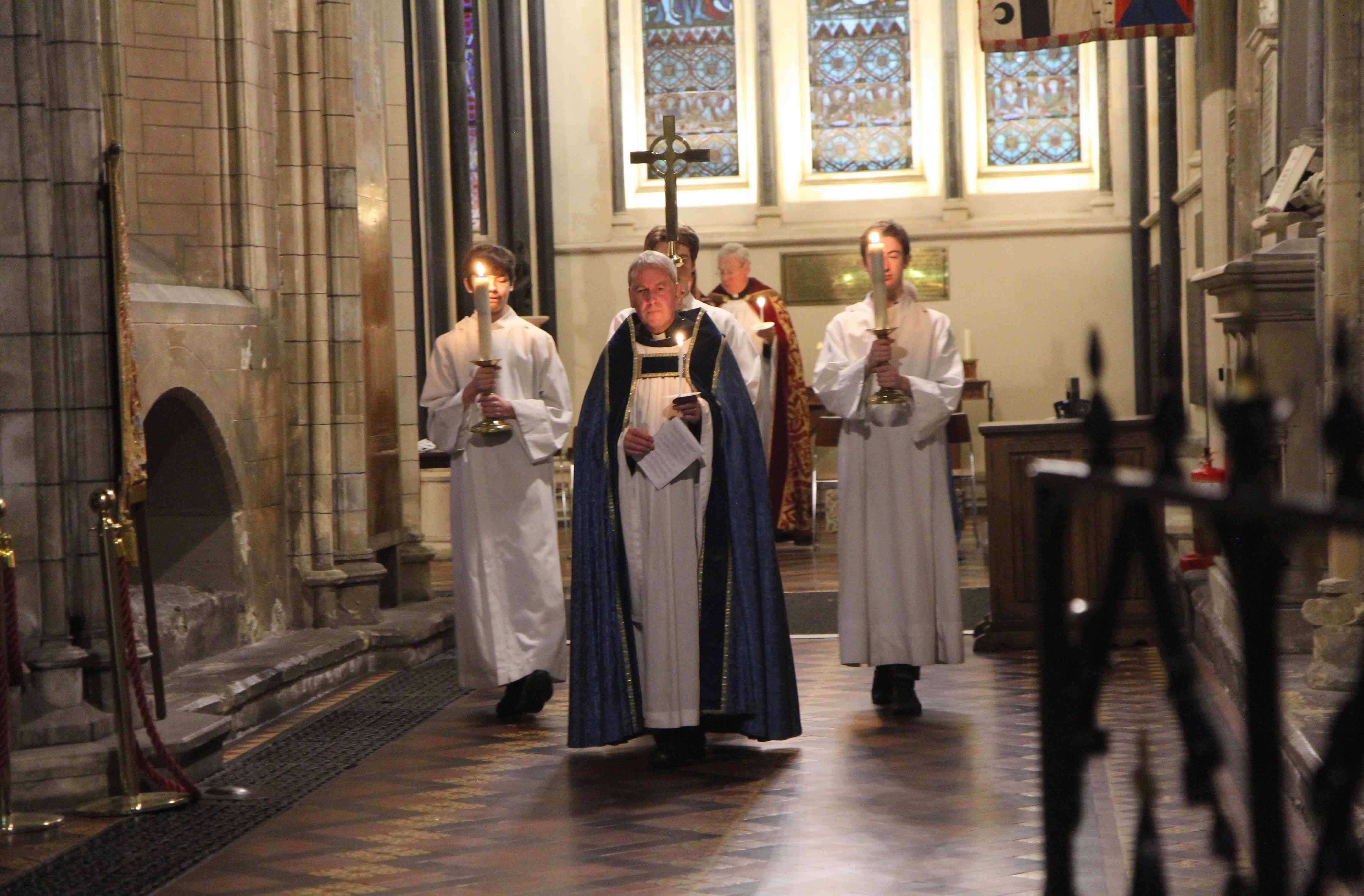 Canon Charles Mullen leads the Advent Procession from the Lady Chapel in St Patrick's Cathedral.