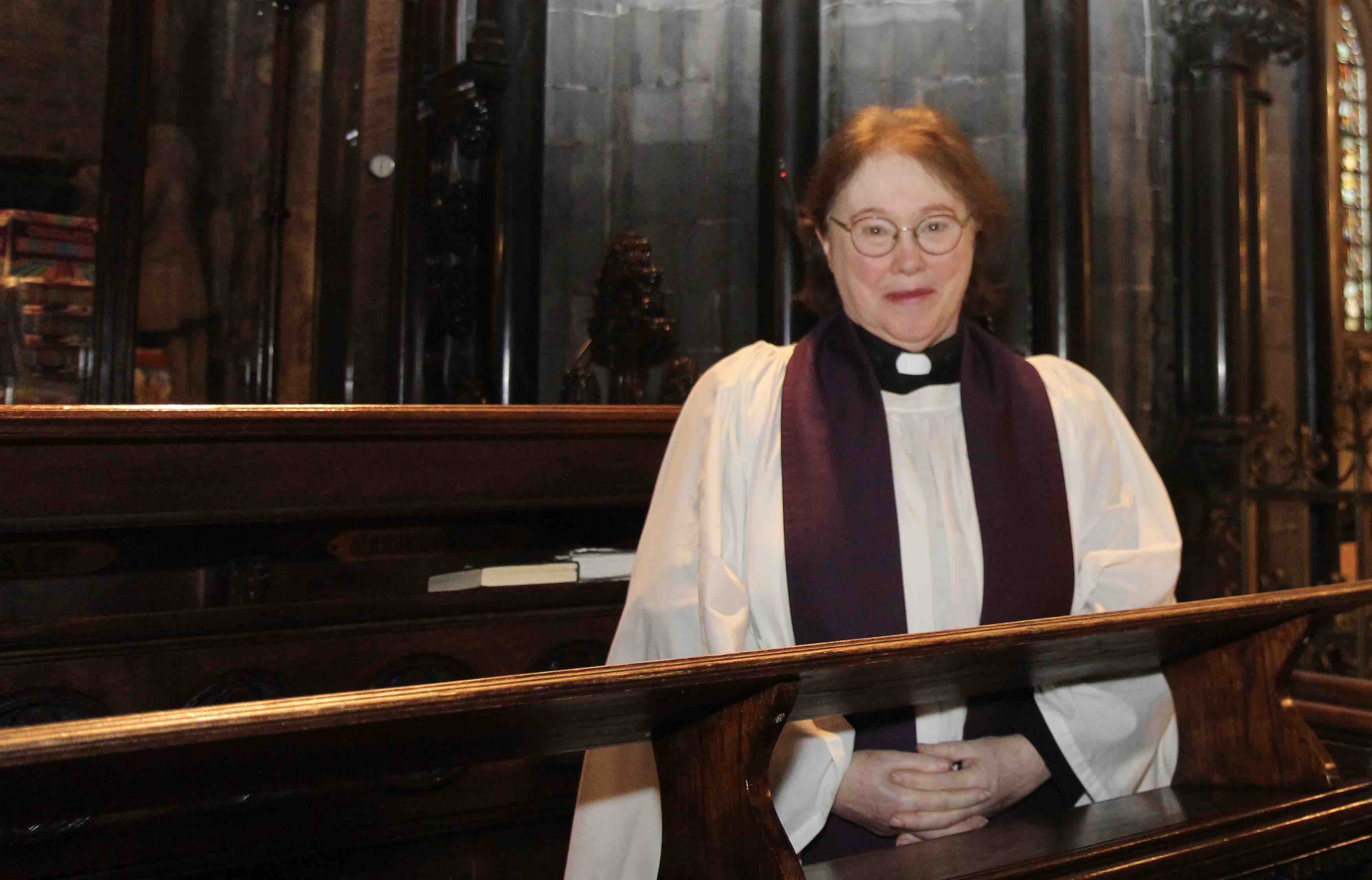 Canon Olive Donohoe in her stall in the choir of Christ Church Cathedral