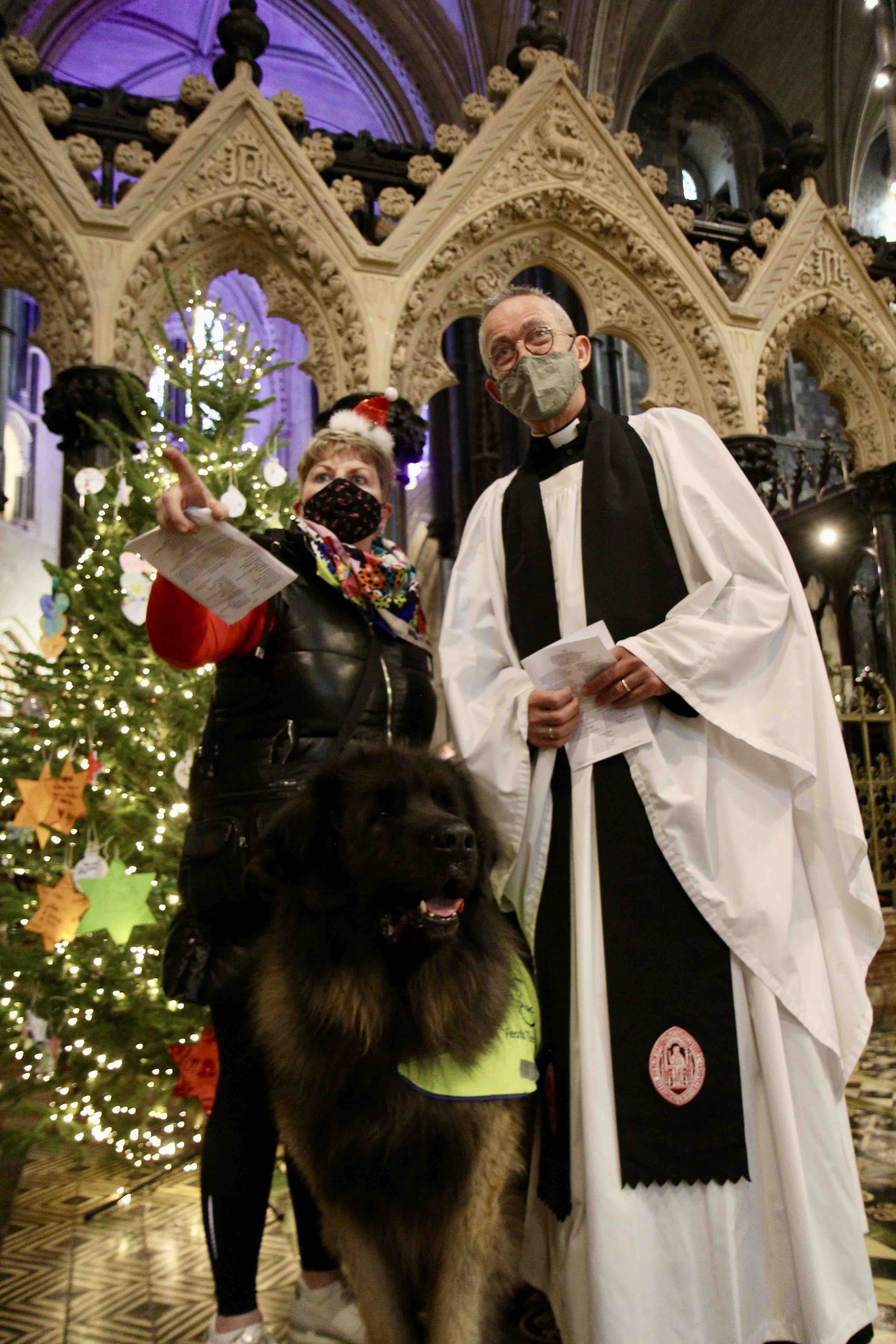 Deirdre Murphy O'Reilly and Magic with Dean Dermot Dunne at the Peata Therapy Dog Carol Service in Christ Church Cathedral.