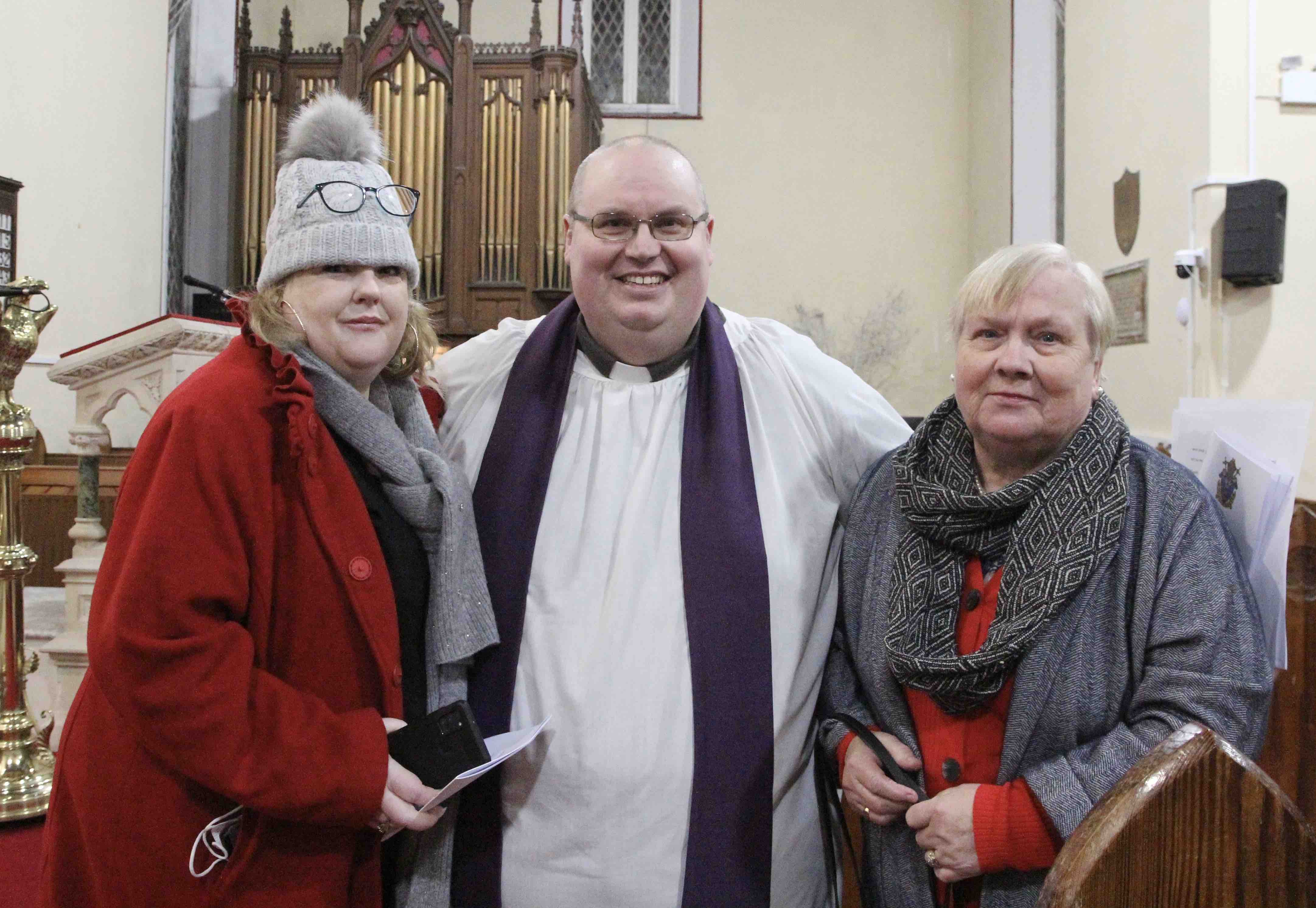 The Revd Conor O'Reilly with his wife Mollie and his mum.
