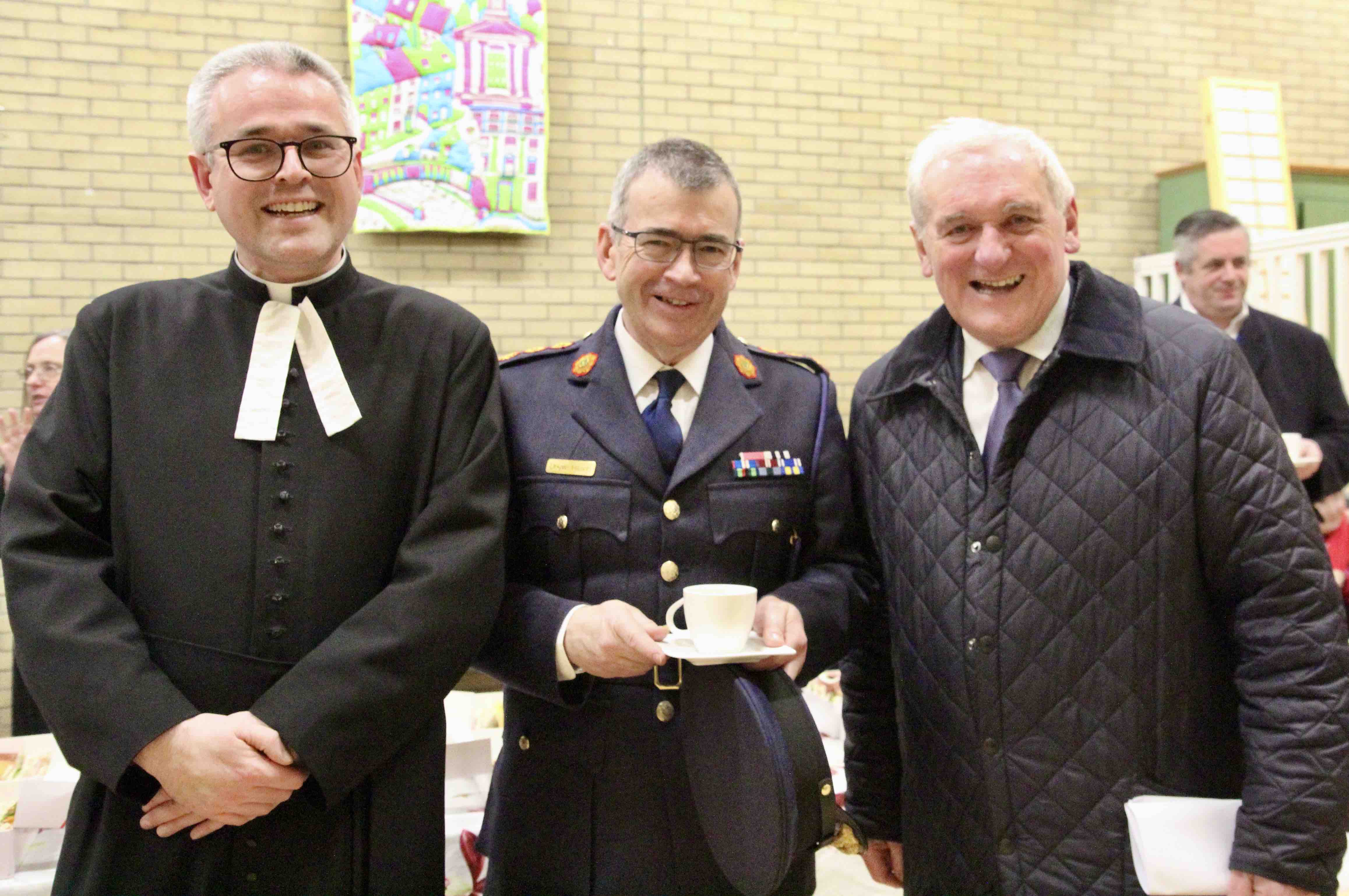 Canon Paul Arbuthnot, Garda Commissioner Drew Harris and former Taoiseach Bertie Ahern.