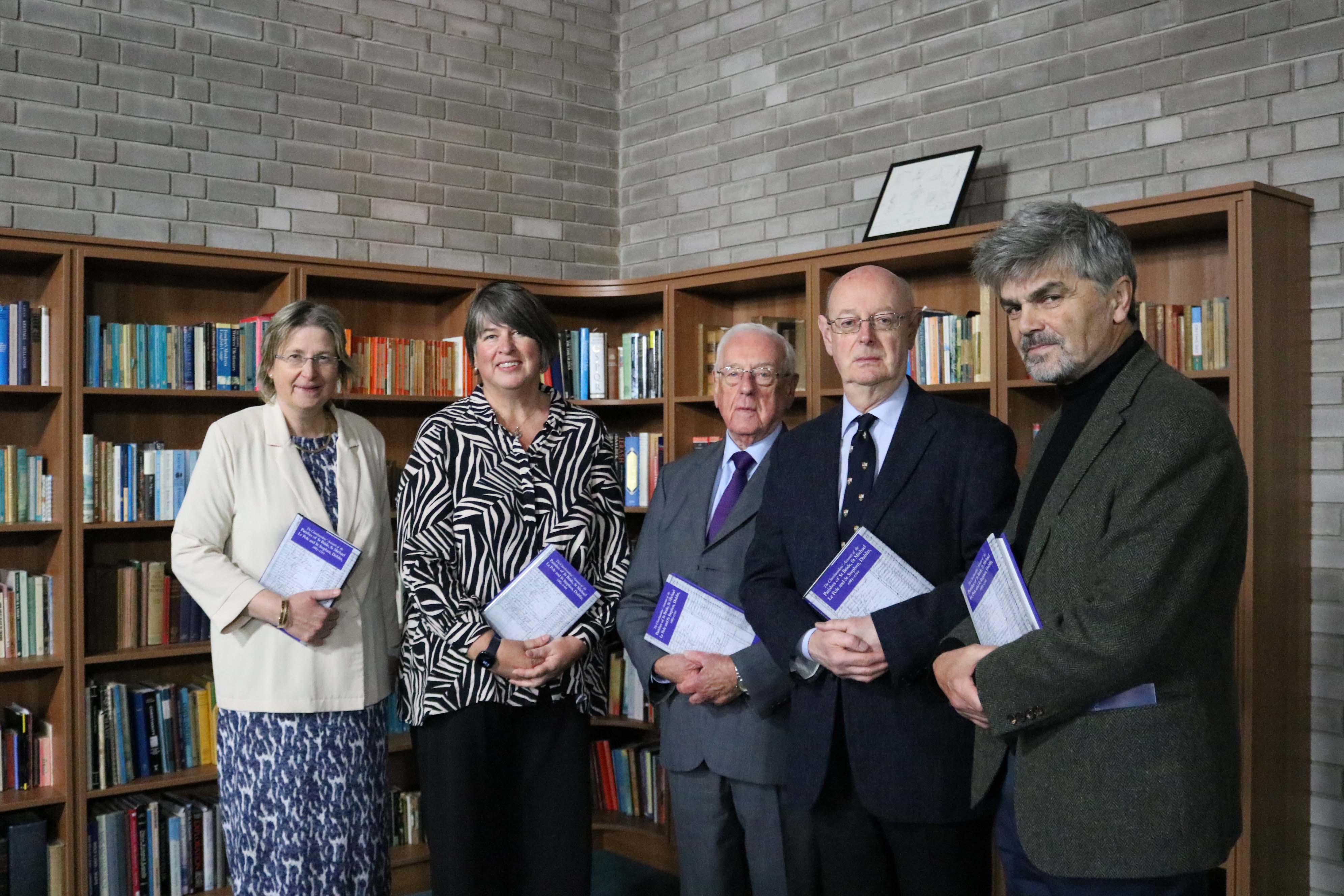 Dr Susan Hood and Pauline High from RCB, WJR Wallace, Dr Ray Refaussé and Professor Alan Ford with The Churchwardens' Accounts.