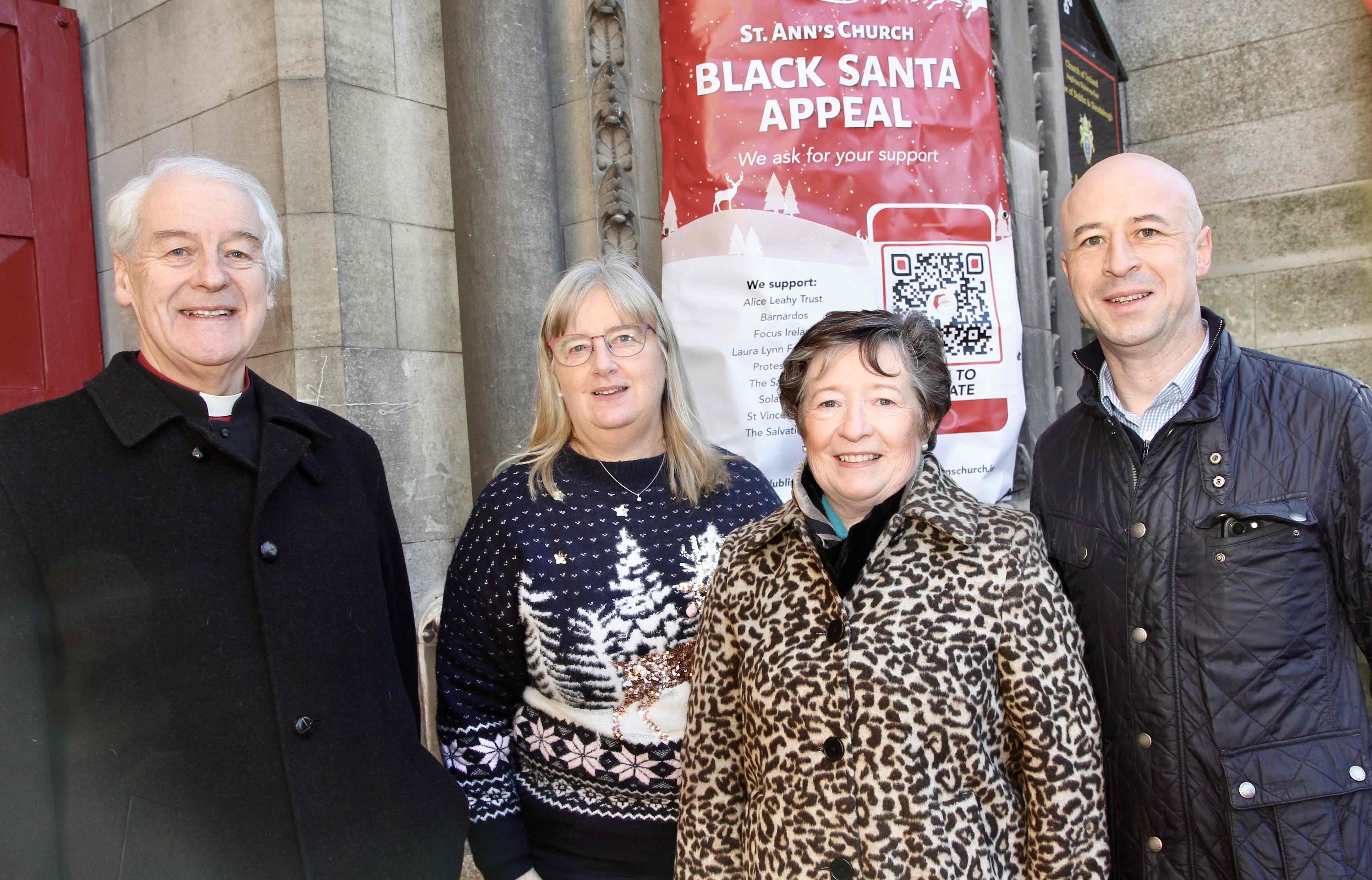 Archbishop Michael Jackson, St Ann's Parish Administrator Kristin Matson, St Ann's Treasurer Wendy Arlow and Derek Scully of Energia at the launch of the Black Santa Sit Out.