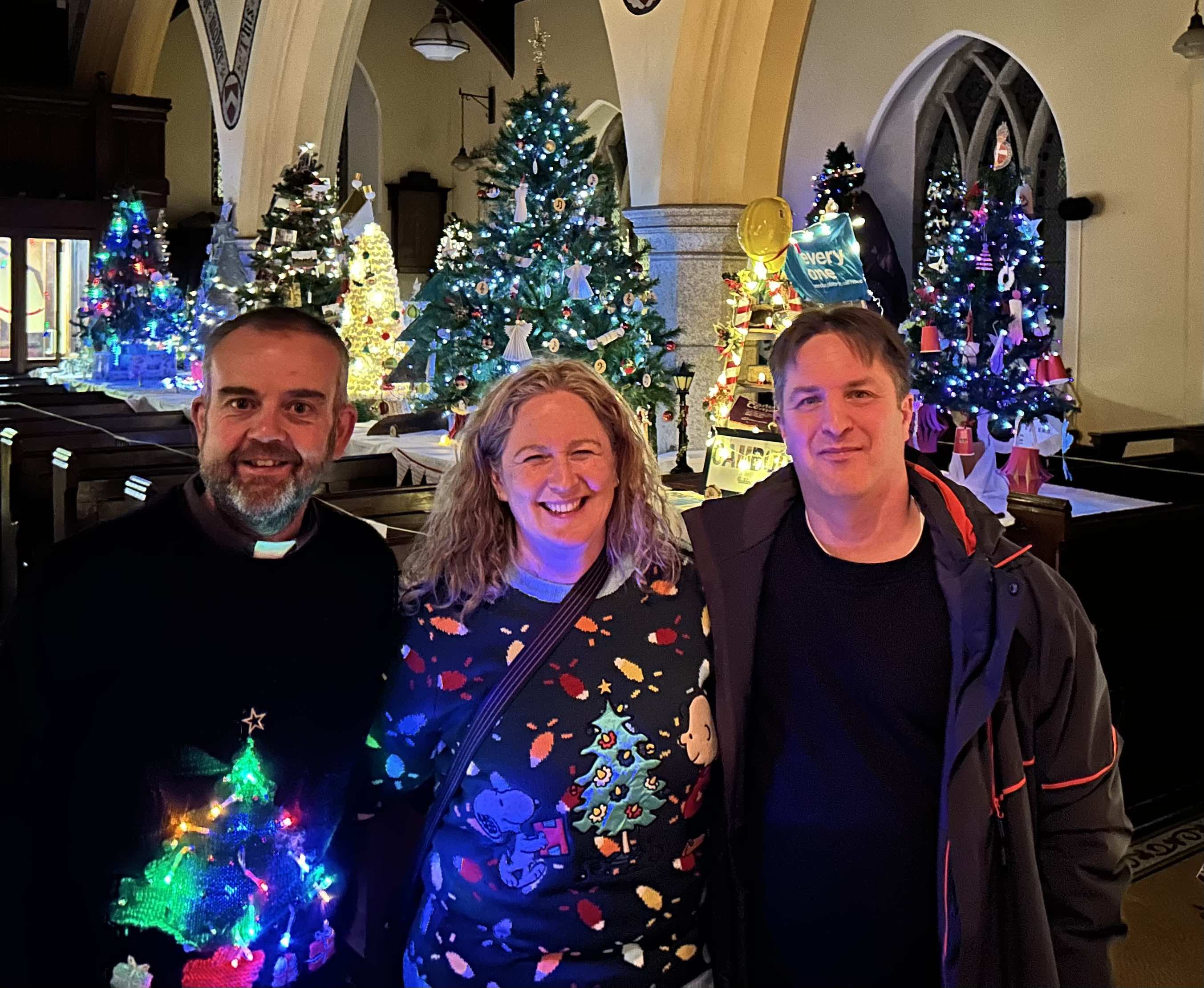 The Revd Colin McConaghie and his wife Janice and Philip Good.