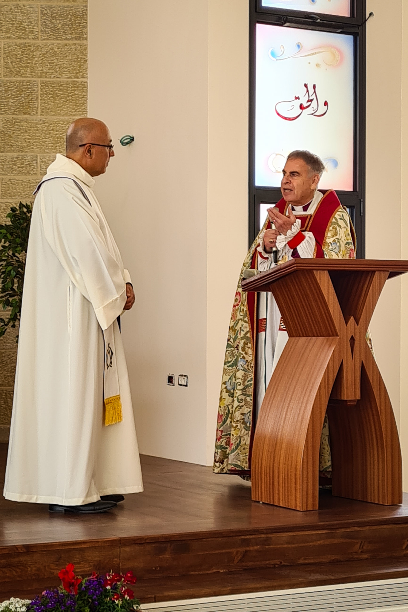 Archbishop Suheil thanks Fr. Hatim for all his hard work and that of his congregation in building the new church. (Photo courtesy of the Episcopal Diocese of Jerusalem)