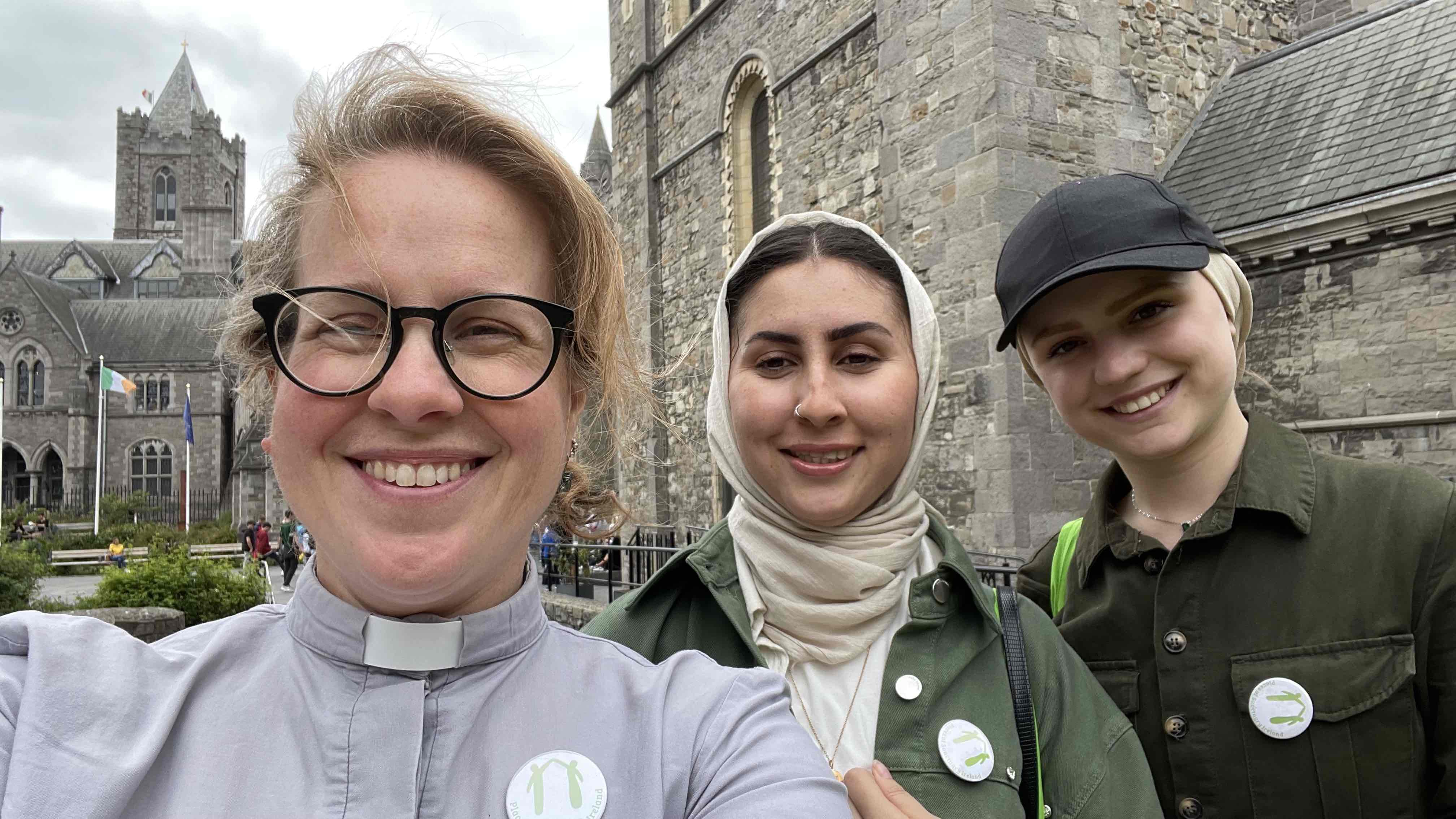 The Revd Abigail Sines with volunteers Nargis and Razan.