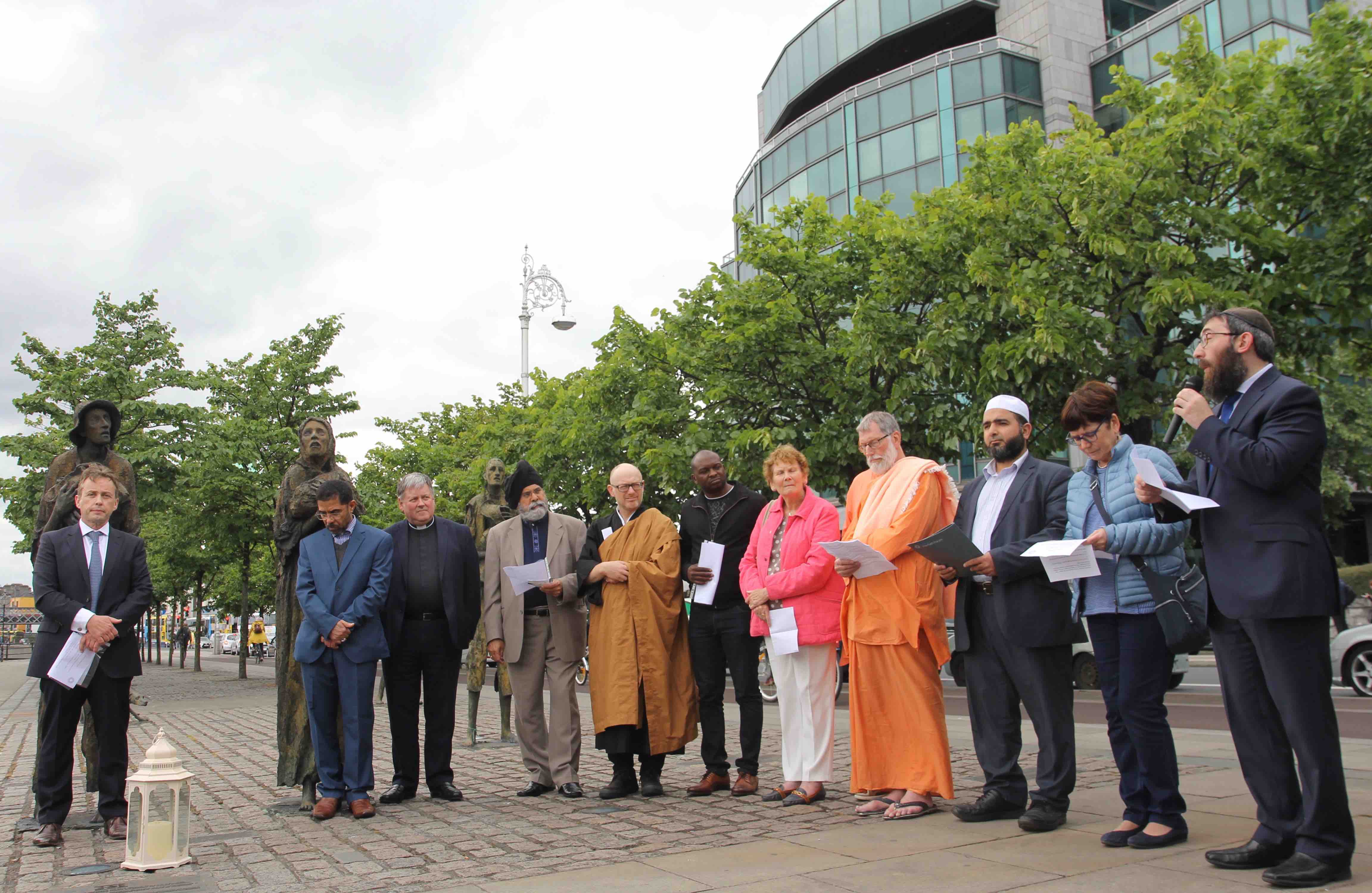 Faith leaders and representatives of many of Dublin's faith communities gathered at the Famine Memorial for an interfaith prayer service organised by DCIF for World Refugee Day.