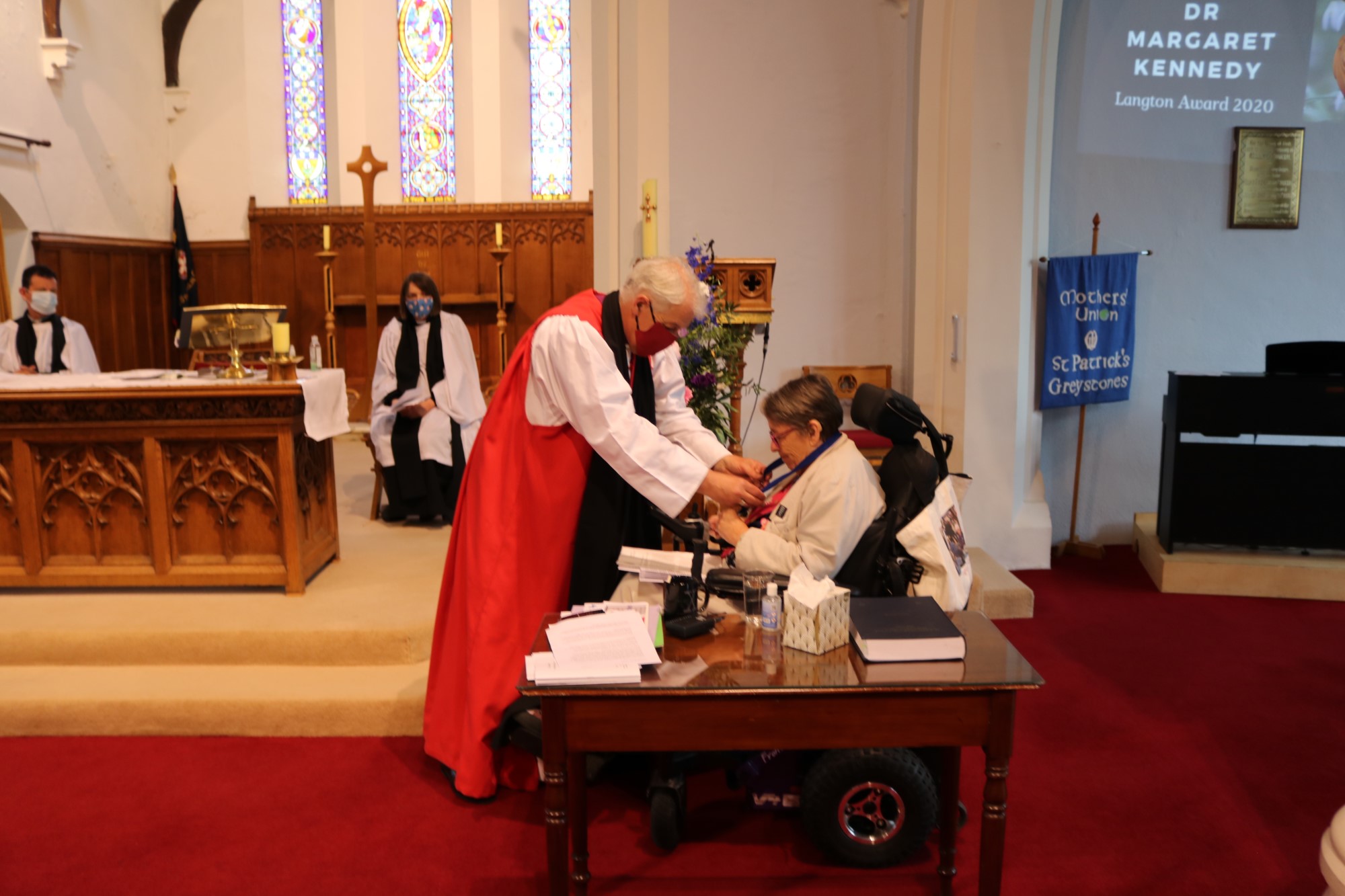 Archbishop Michael Jackson presents the Langton Award for Community Service to Dr Margaret Kennedy.