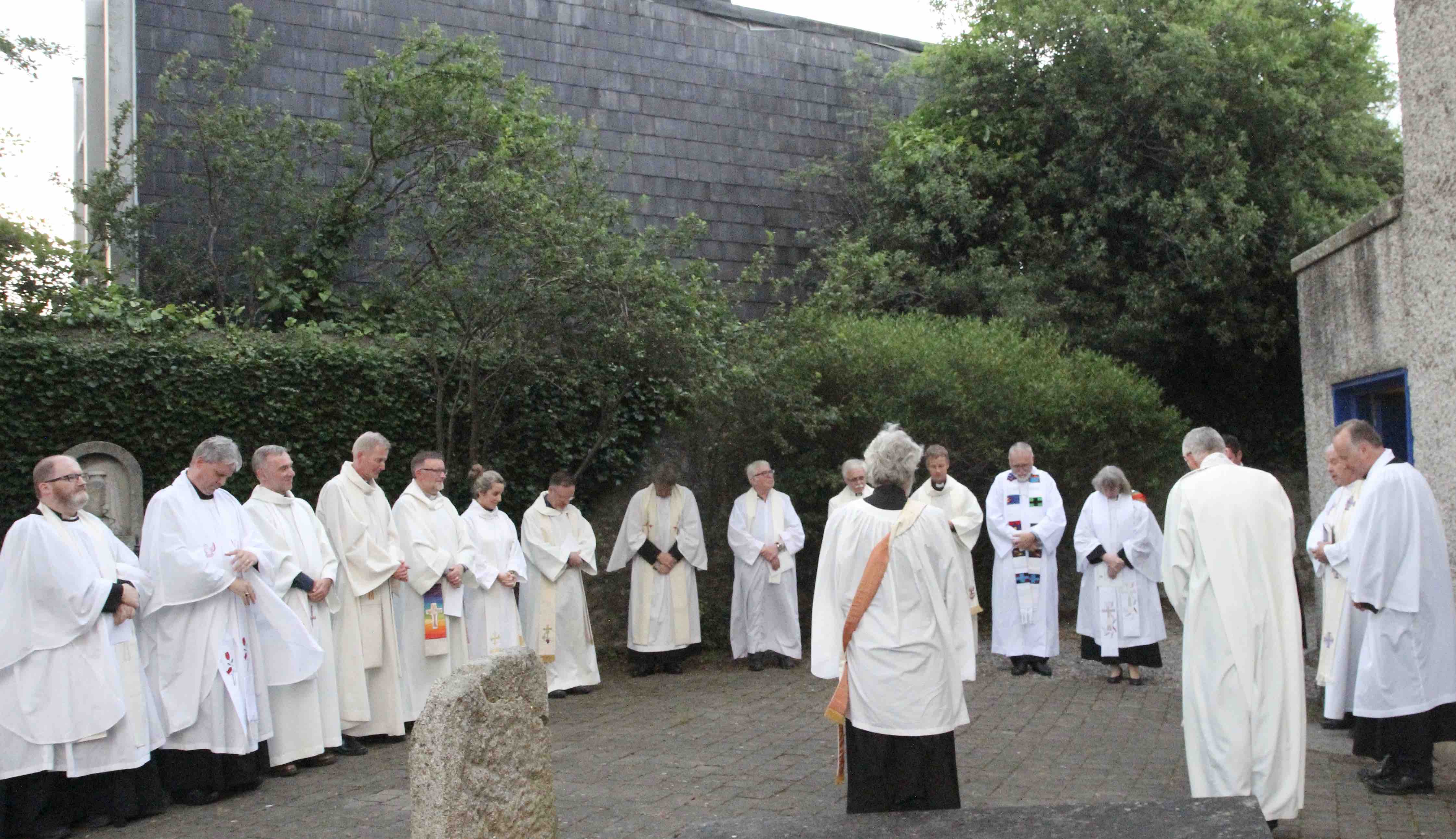 Clergy gather outside St Brigid's Church after the Service of Institution.