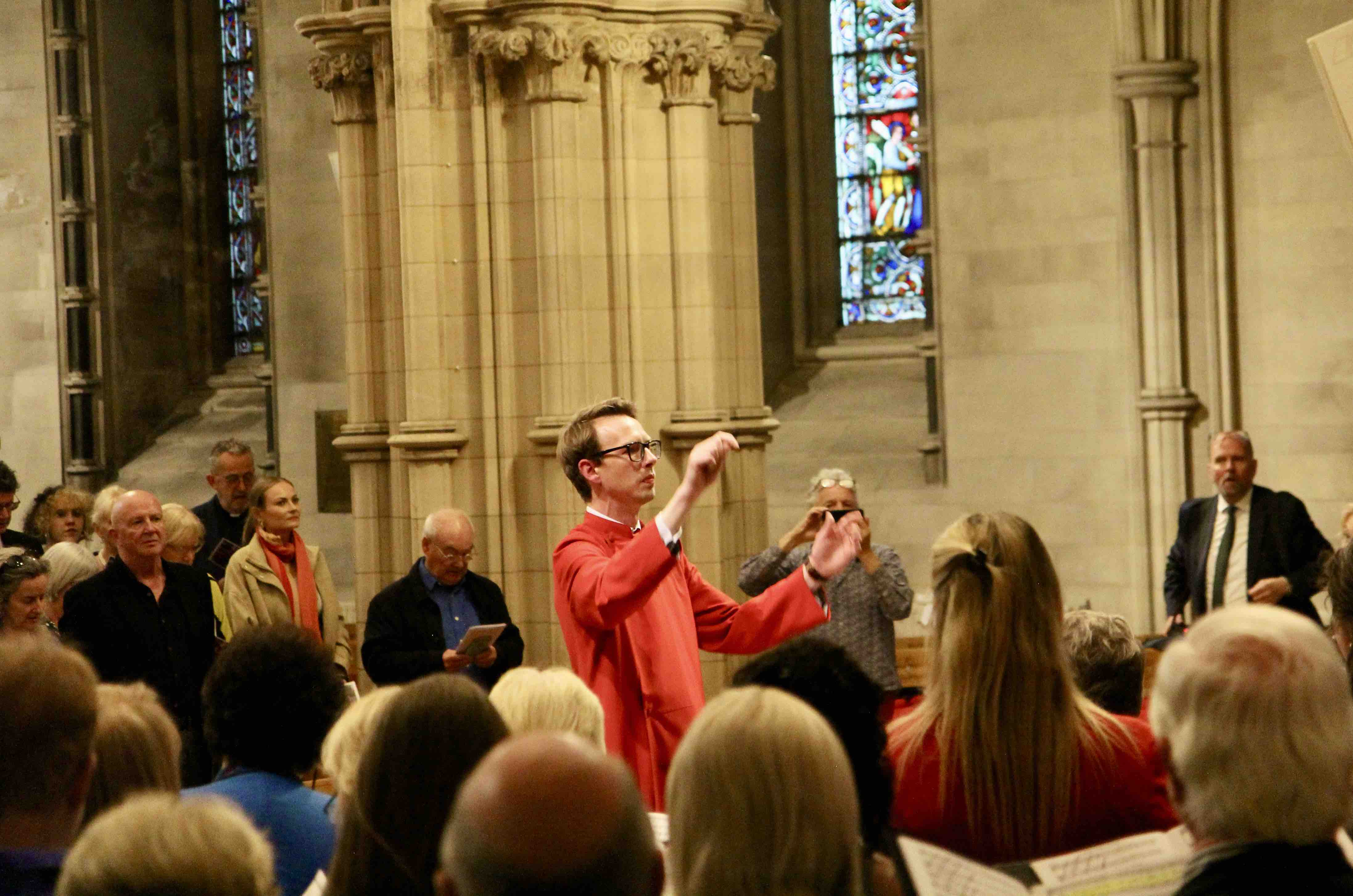 Tom Little conducting the choirs.