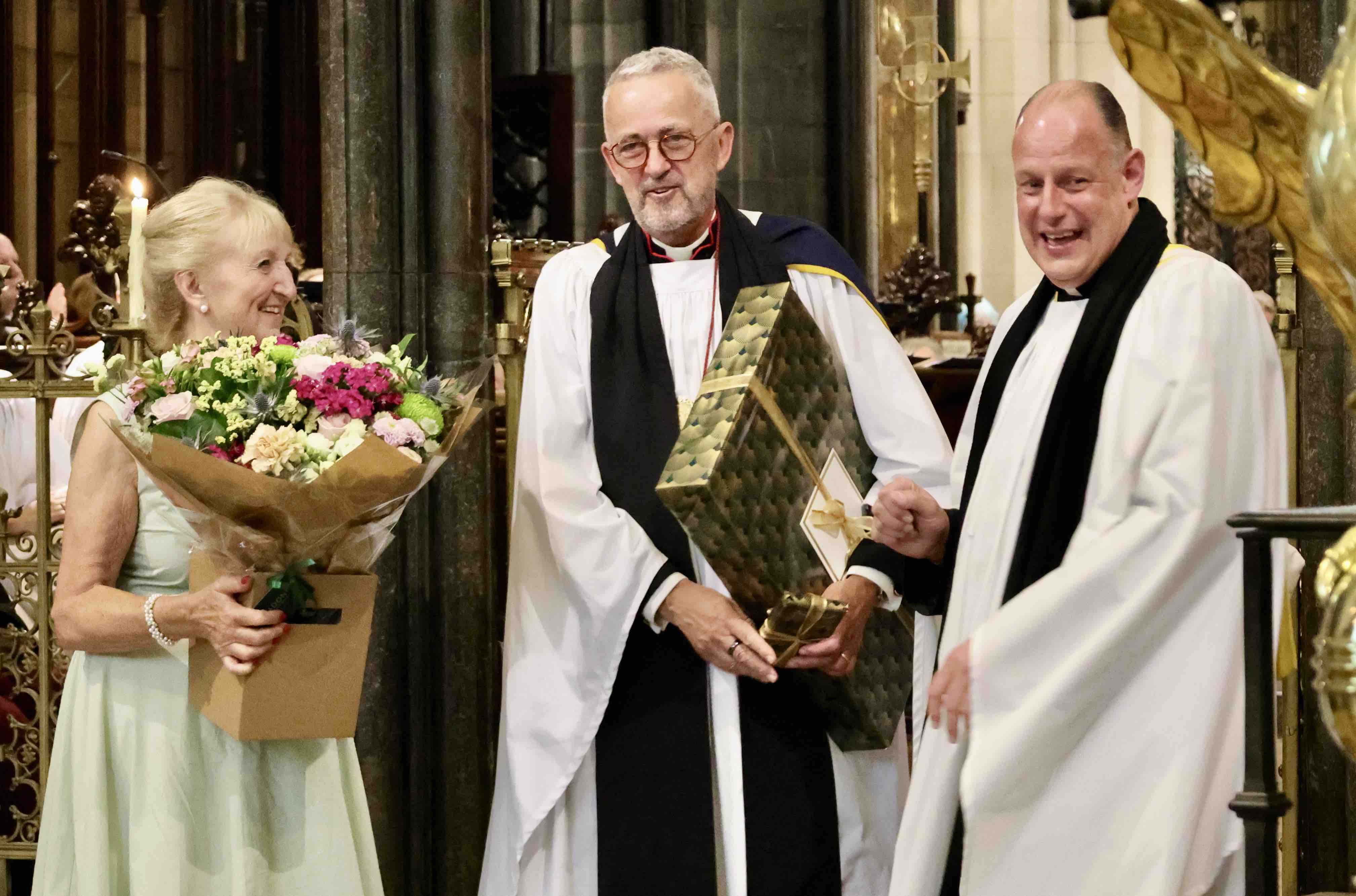 Celia and Dean Dermot Dunne are presented with gifts from the cathedral family by Canon Roy Byrne.