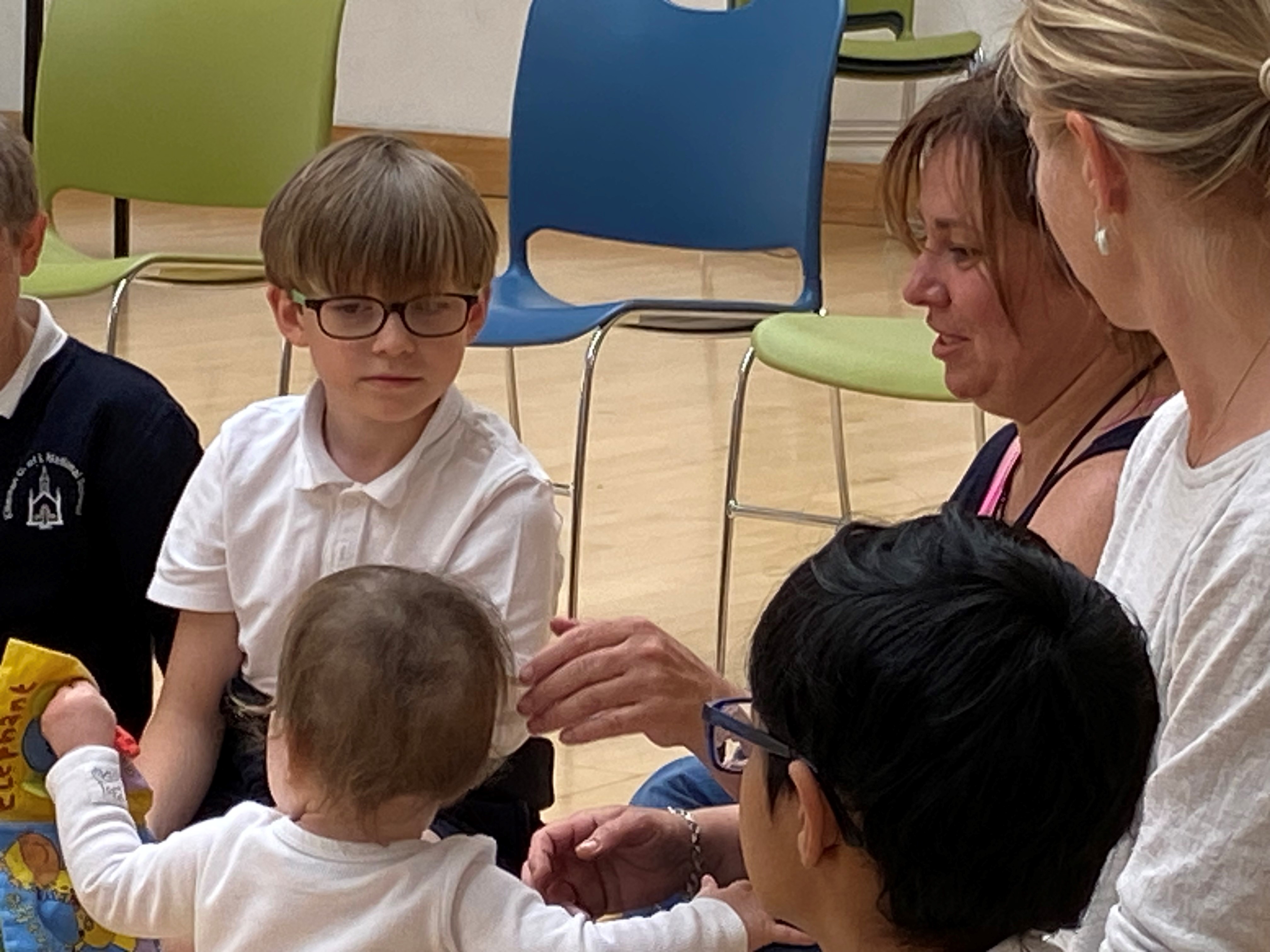 Children engage with the Tiny Teacher.