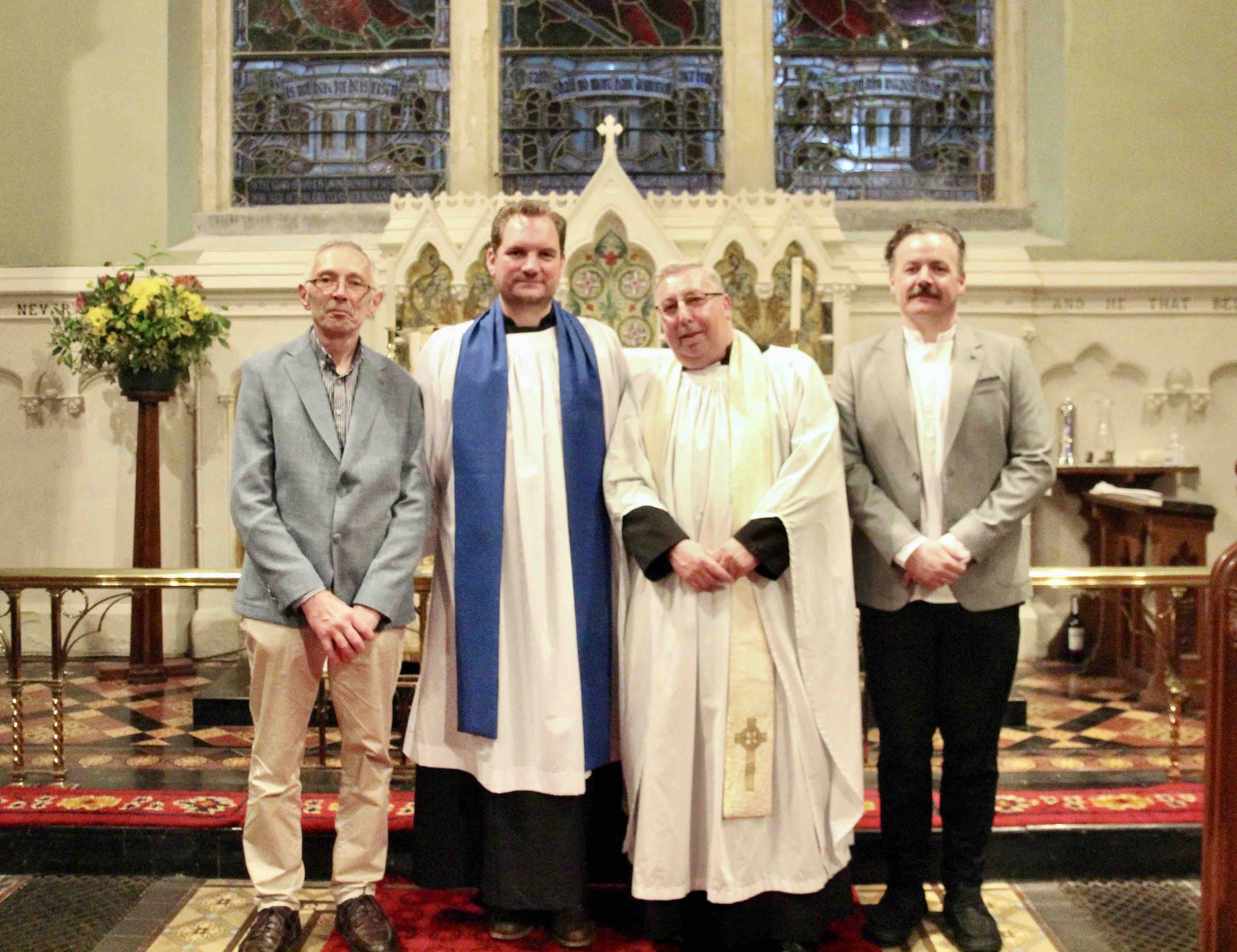 The Revd Steve Brunn, Lay Reader Daniel Stanford and Church Wardens David Maybury and Brian Lee.
