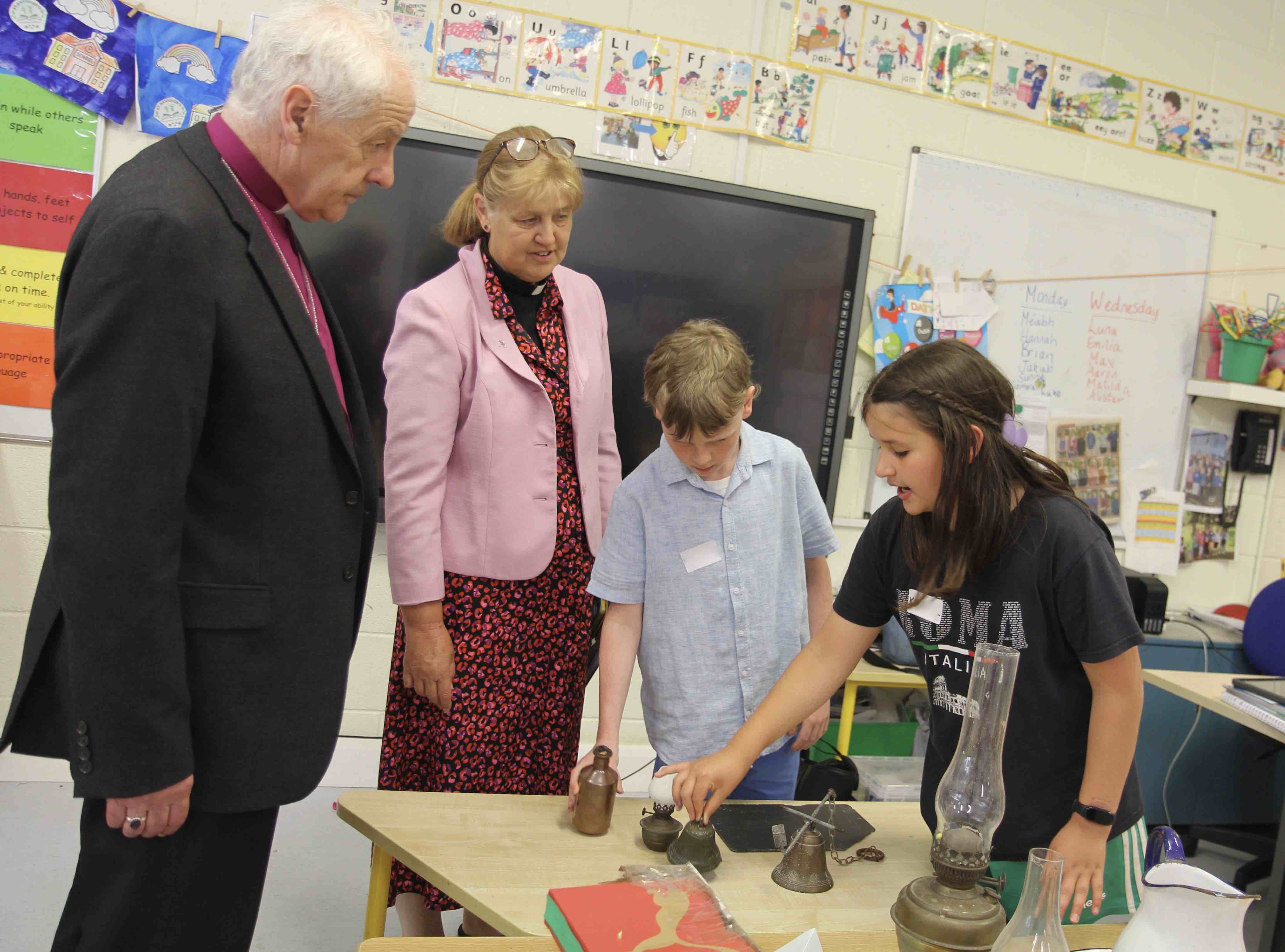 'Tour guides' showed Archbishop Jackson and the Revd Suzanne Harris some of the many artifacts on display.