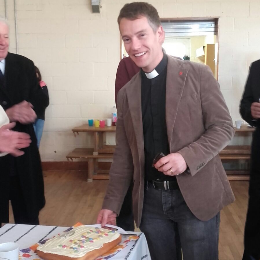 The Revd Jack Kinkead celebrates with cake.