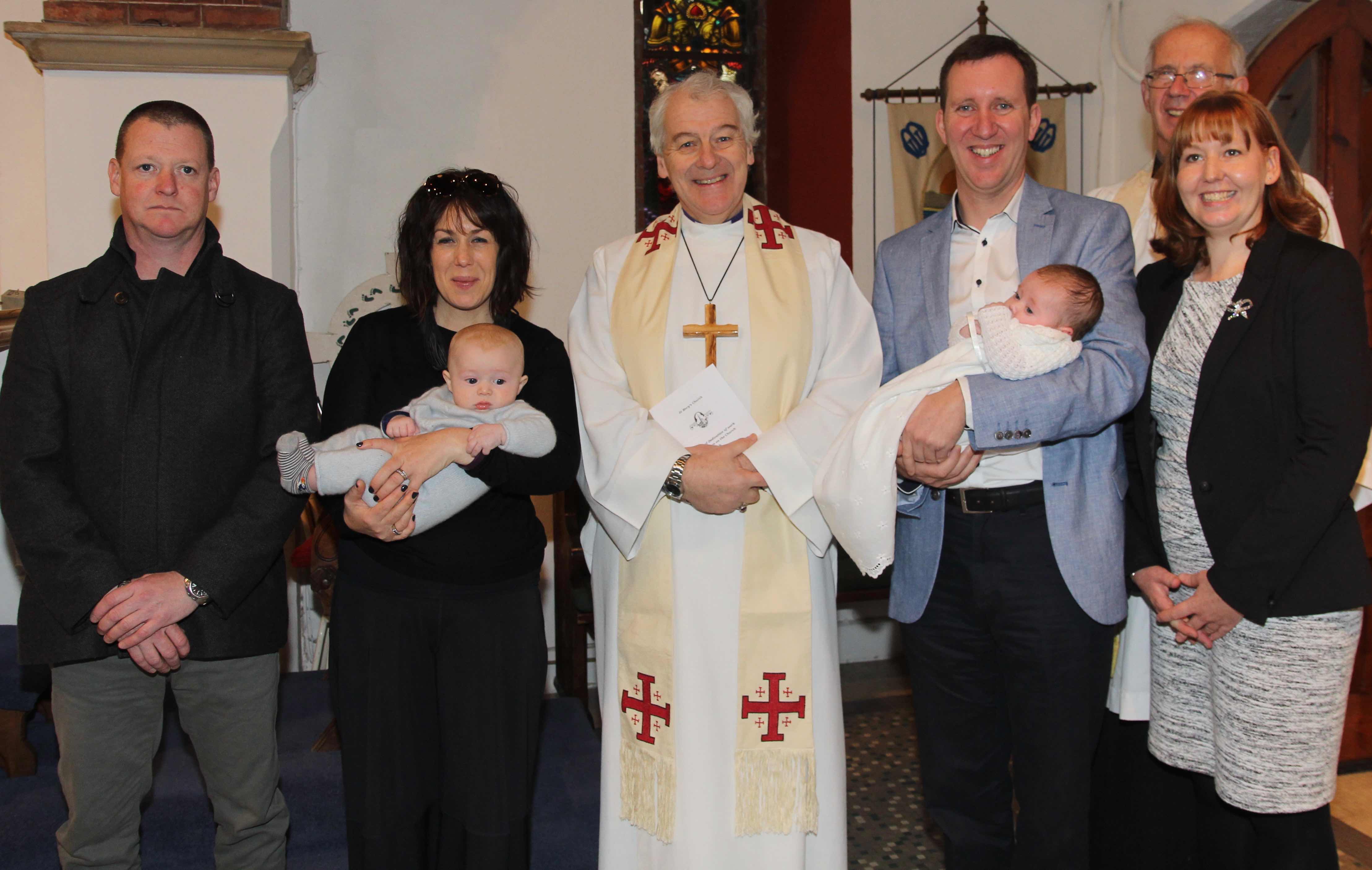 The McMurtry and the Caldwell Ryan families with Archbishop Michael Jackson