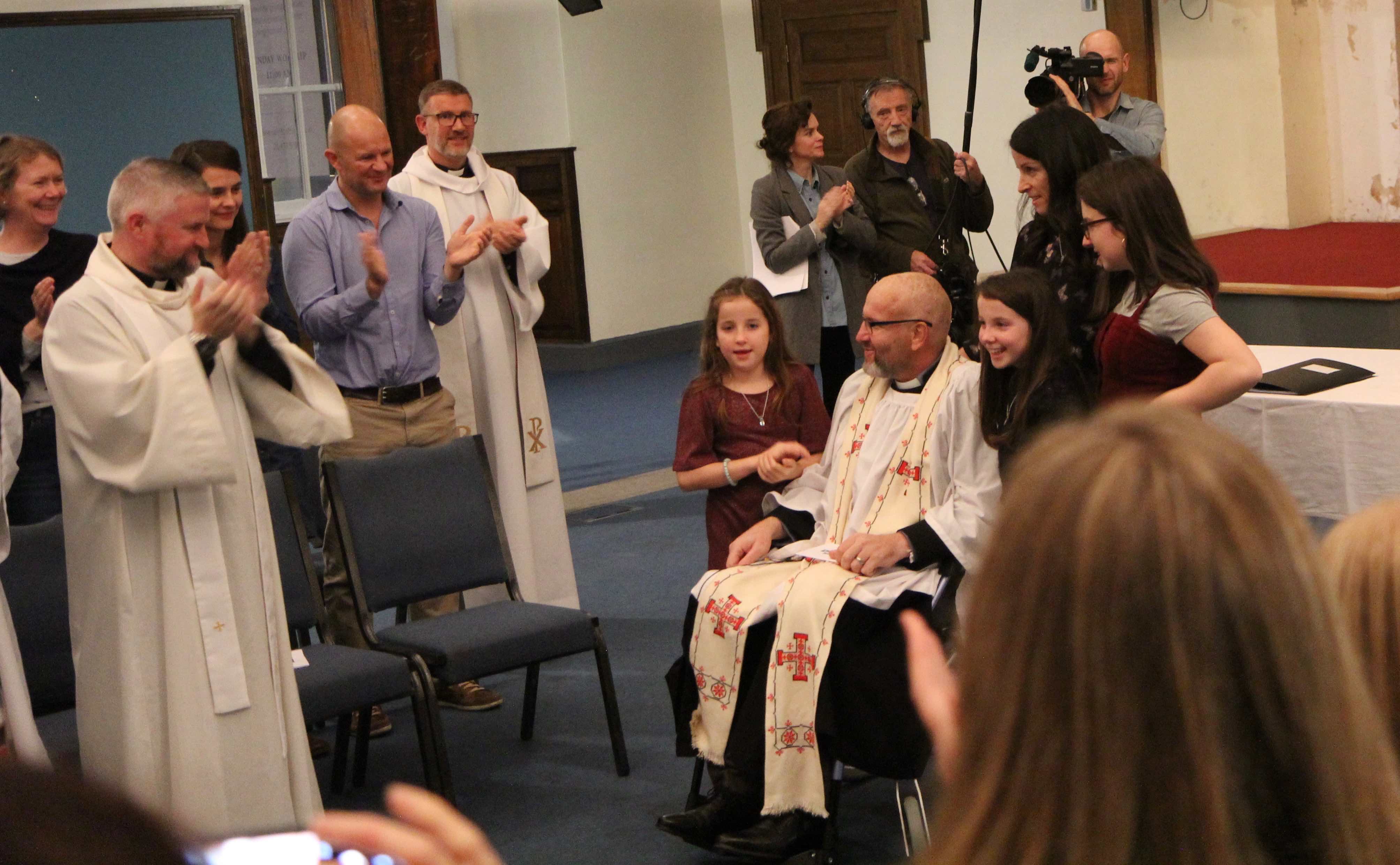 The Revd Graham Jones, with his wife Louise and their children.