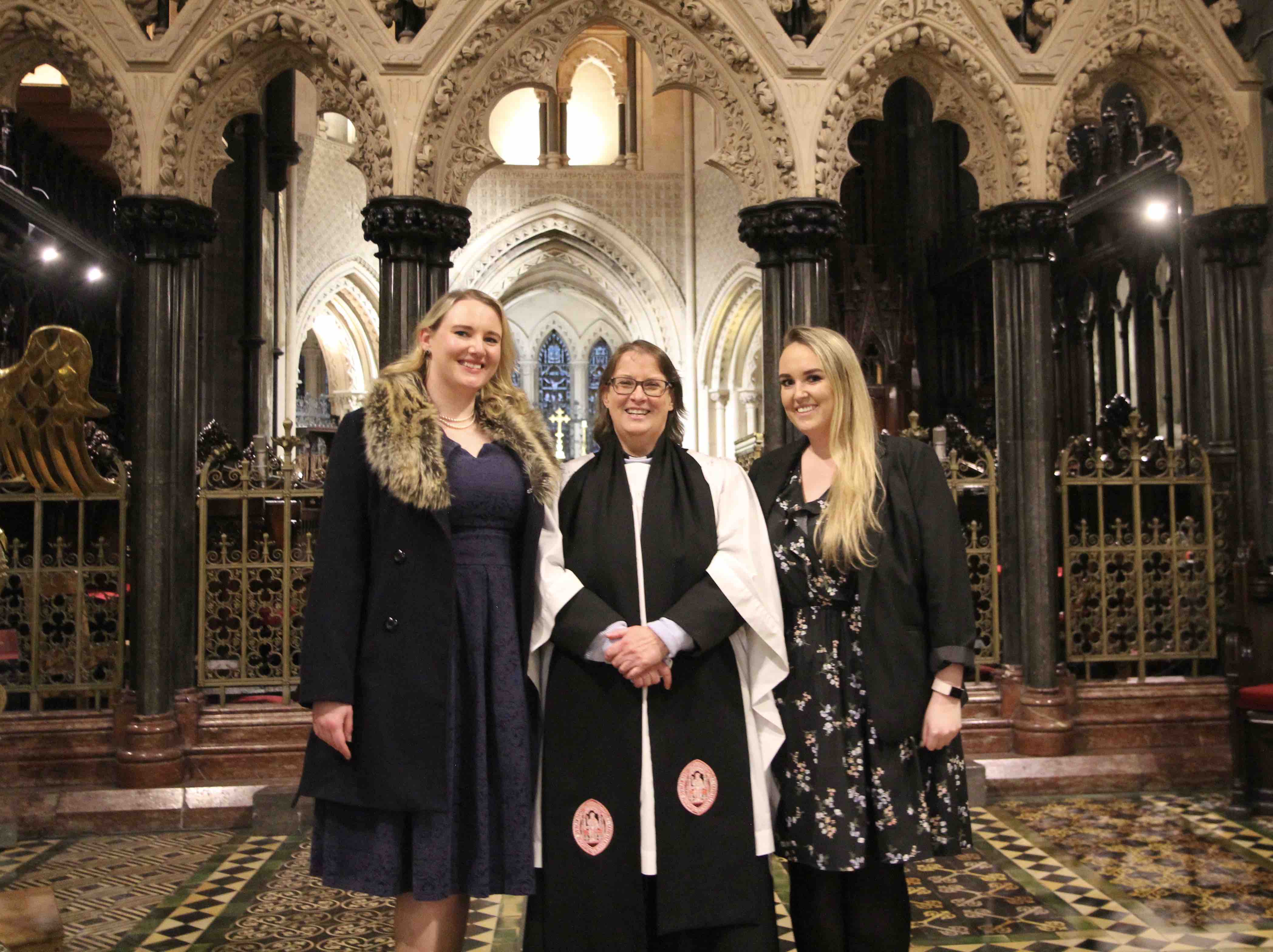 Canon Lesley Robinson with her daughters.