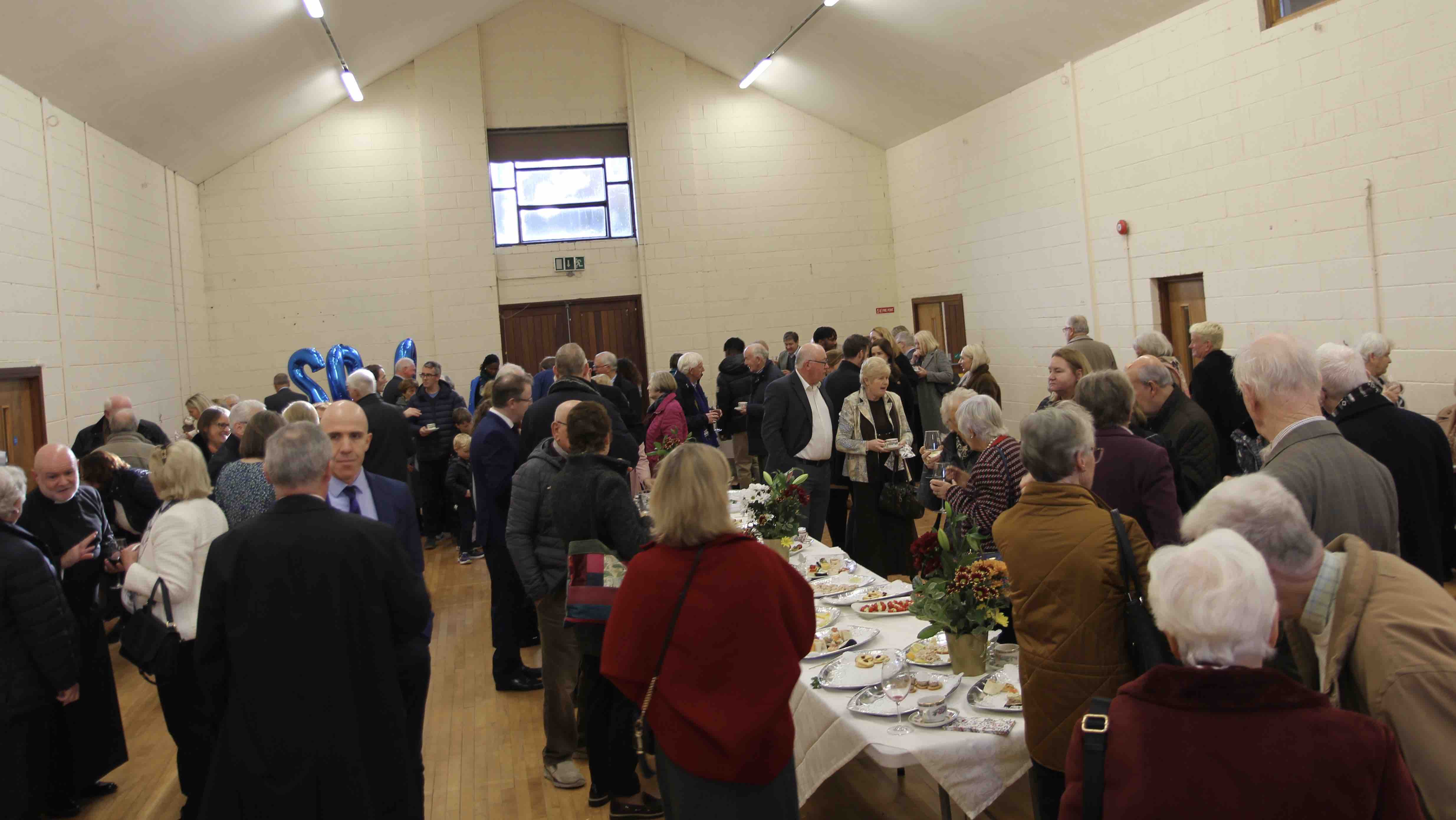 Parishioners gathered in the parish centre for a reception after the service.