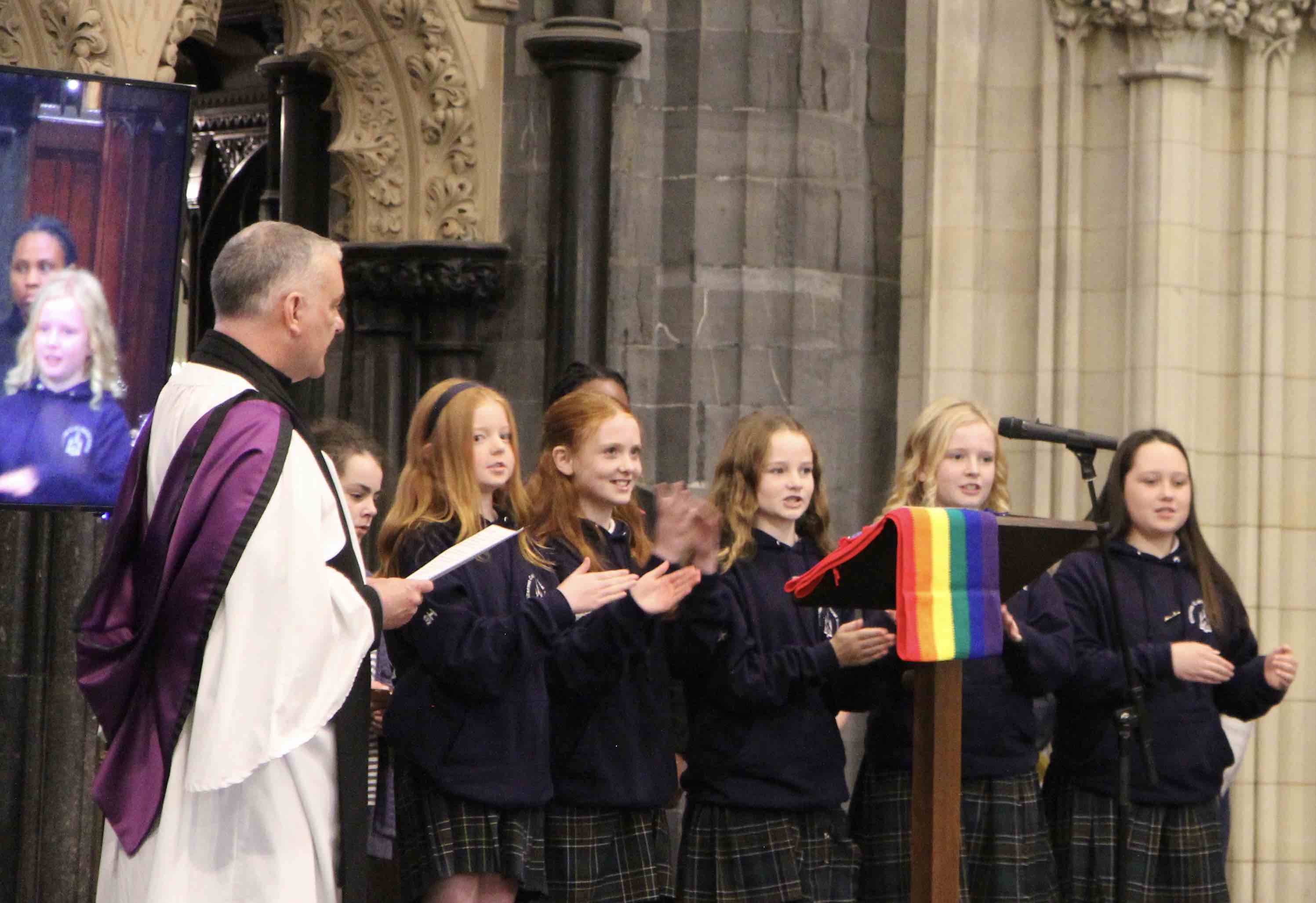 Pupils lead prayers during the service.