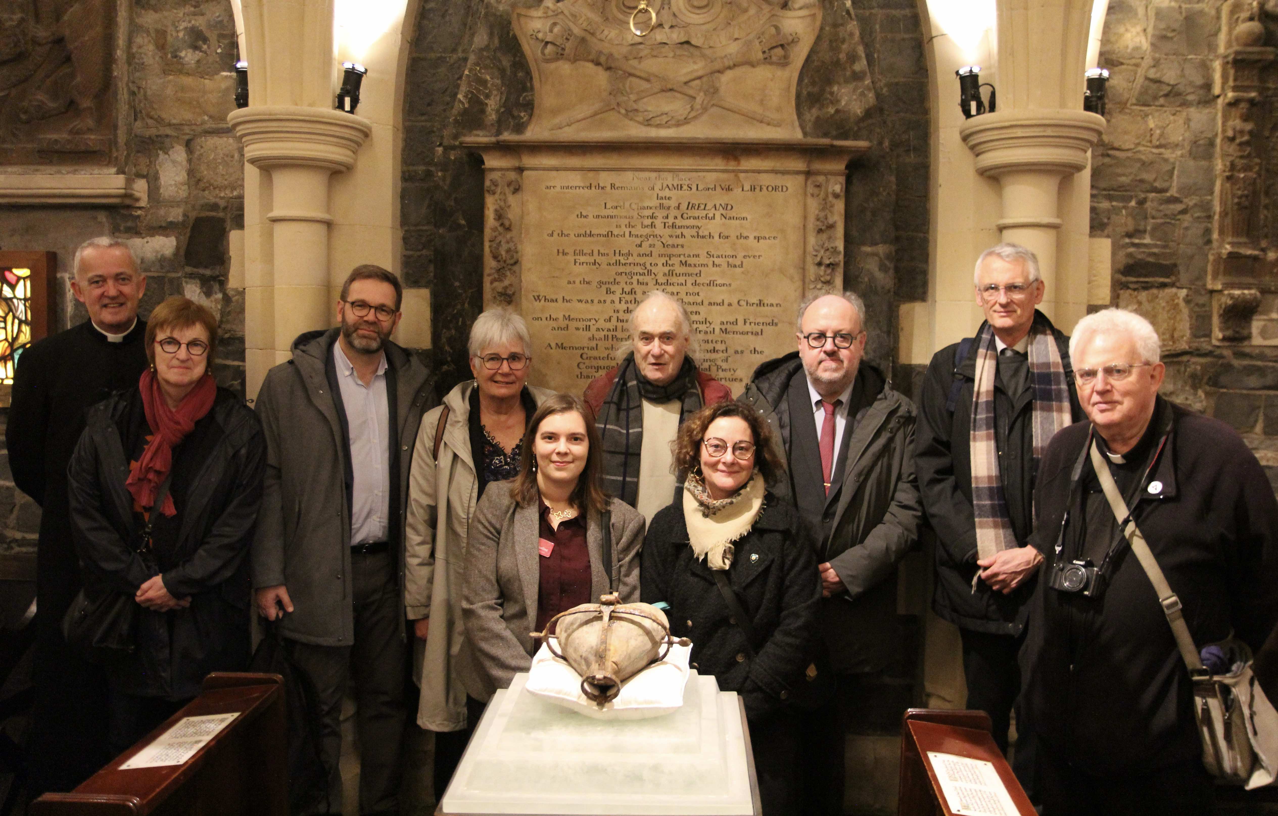 Visitors from Eu in Normandy view the Heart of St Laurence O'Toole.