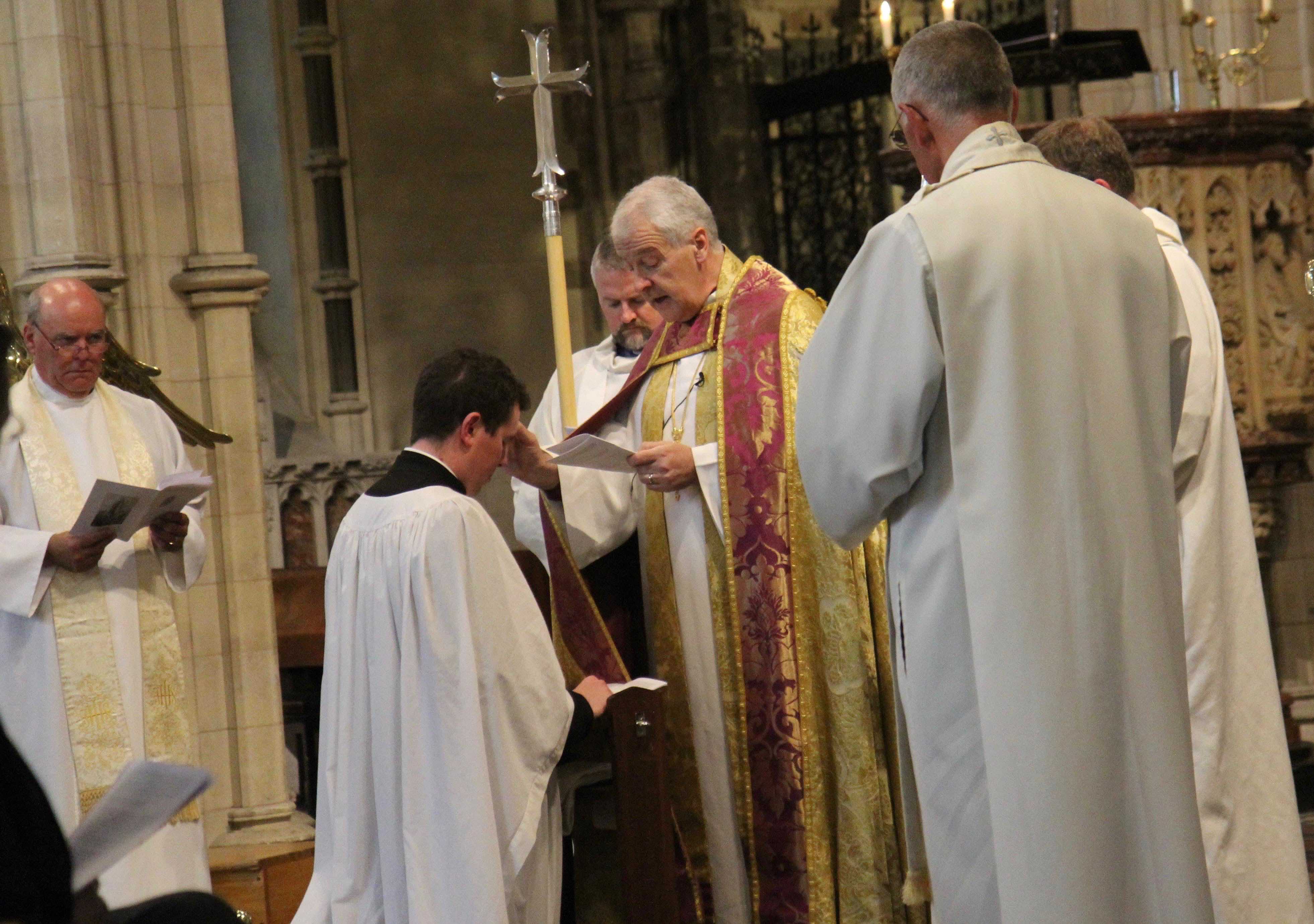 Archbishop Michael Jackson anoints the Revd Sean Hanily during the Service of Ordination