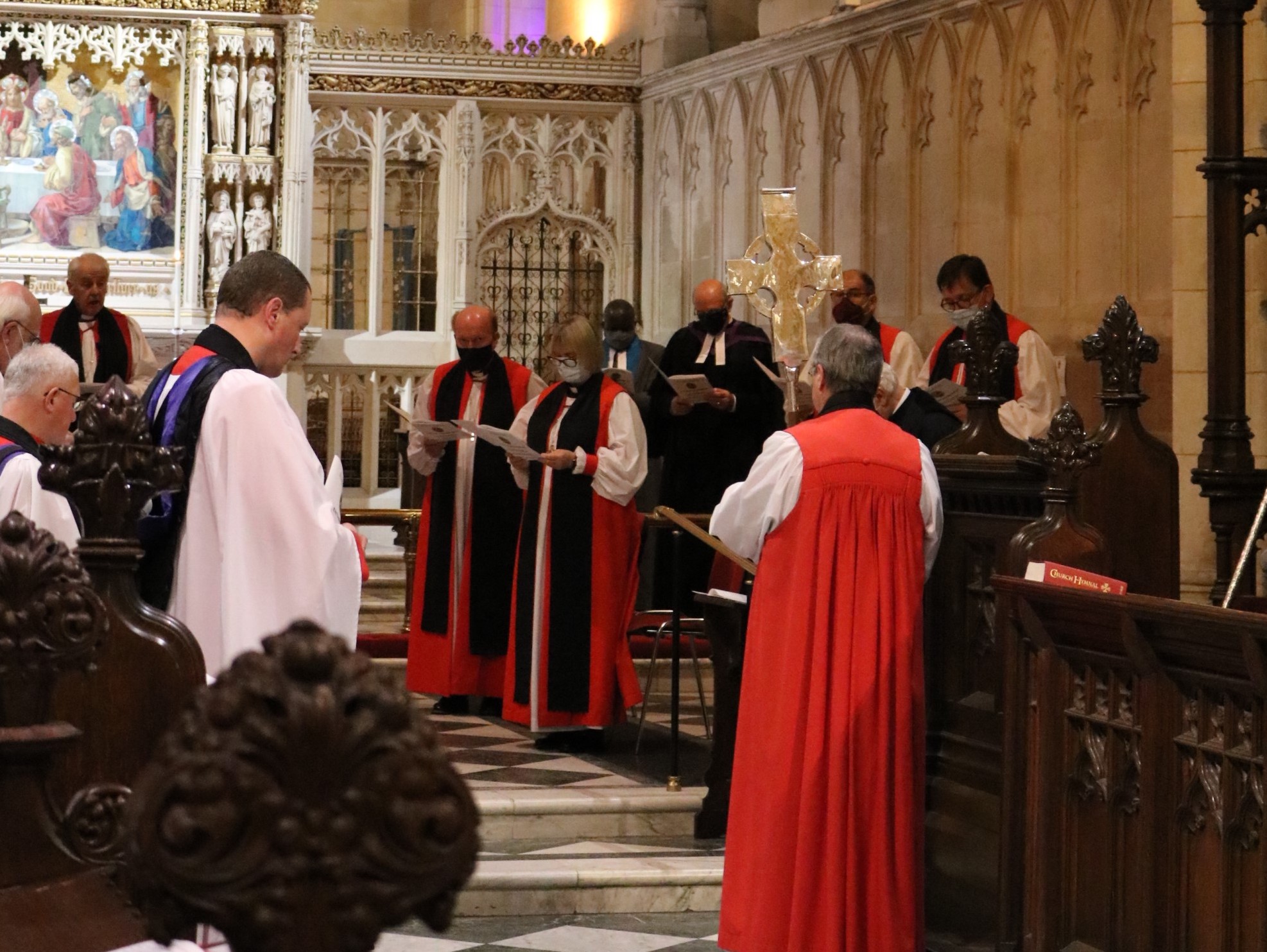 The Most Revd Dr Michael Jackson, Archbishop of Dublin, presents the Metropolitan Cross to Archbishop John McDowell.