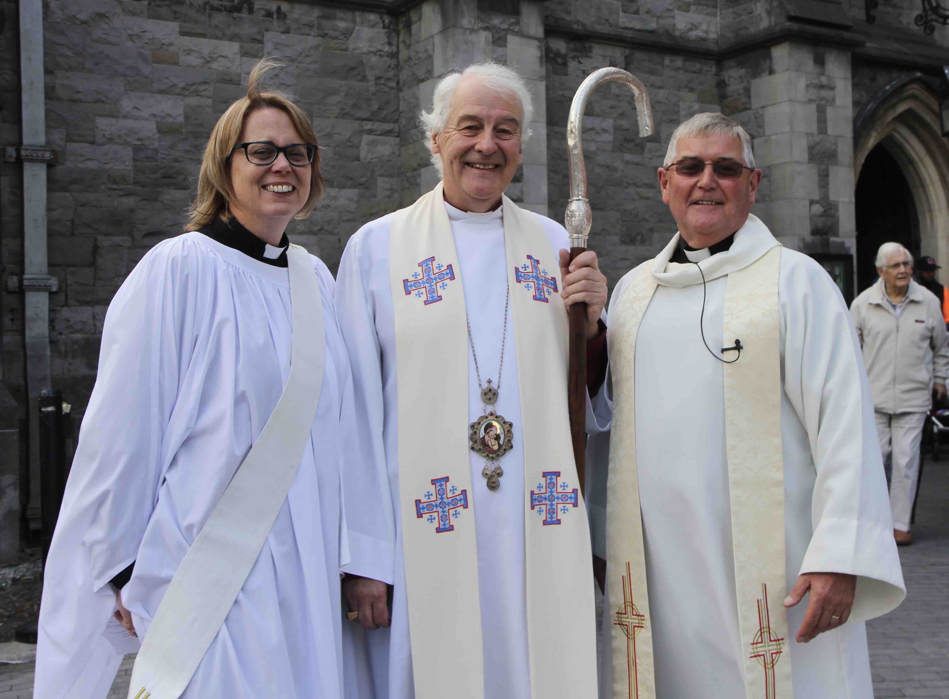 The Revd Jane Burns with Archbishop Michael Jackson and the Revd Nigel Pierpoint, Rector of Taney.