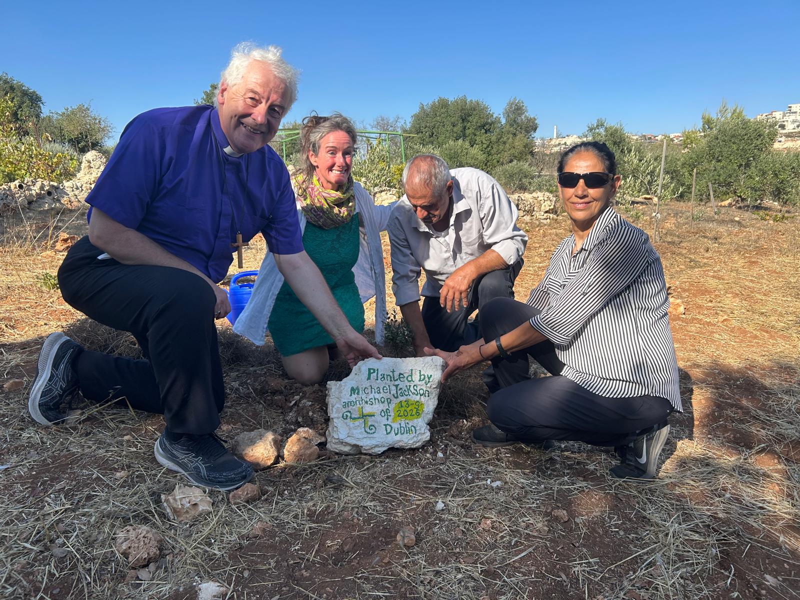Planting a tree at the Tent of Nations. The last person to plant a tree there was Archbishop Sarah Mulally, Archbishop of Canterbury.