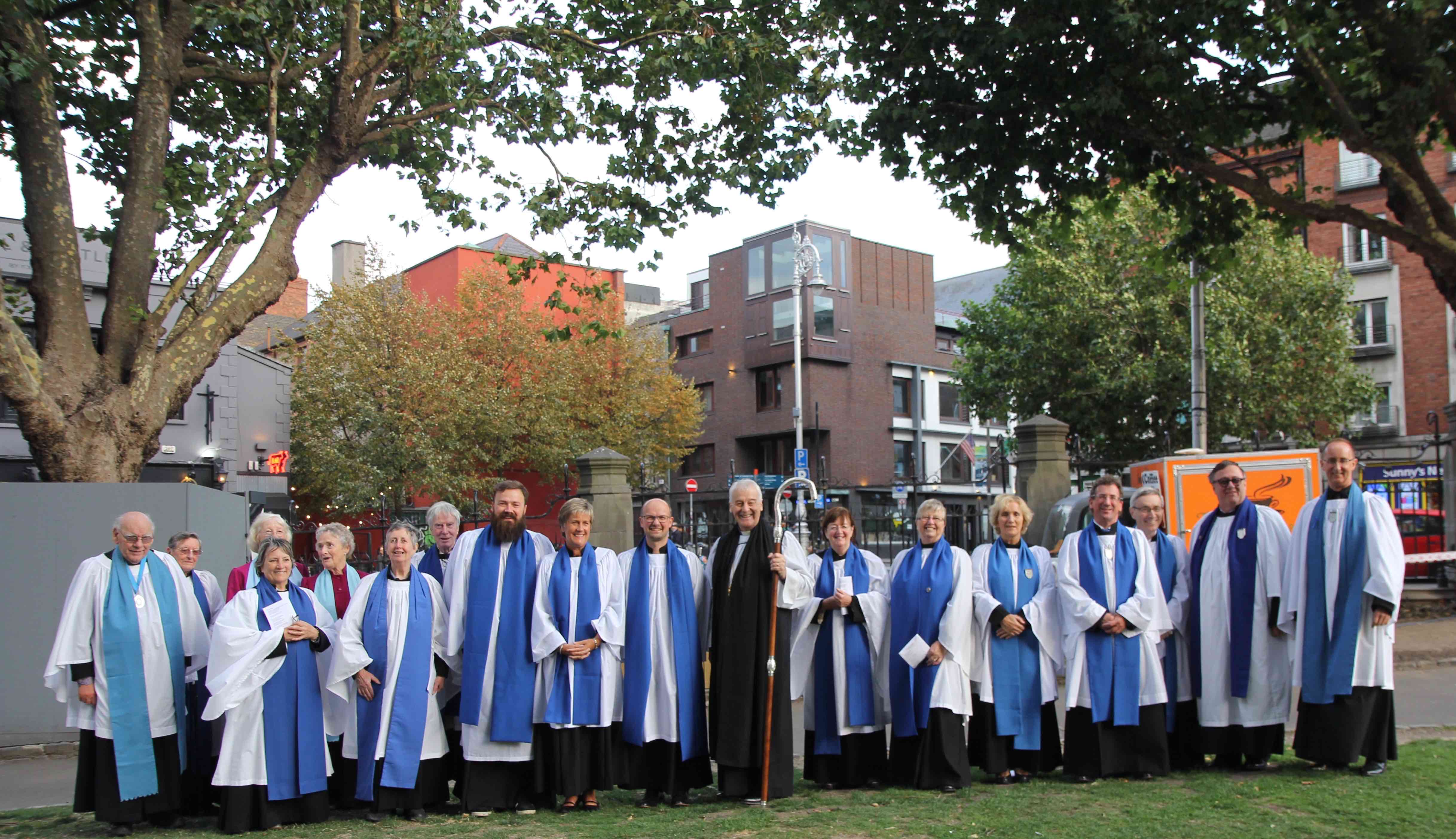 Newly commissioned Diocesan Readers Ruth Gyves, Scott Hill and Scott Evans with their fellow Diocesan Readers and Archbishop Michael Jackson.